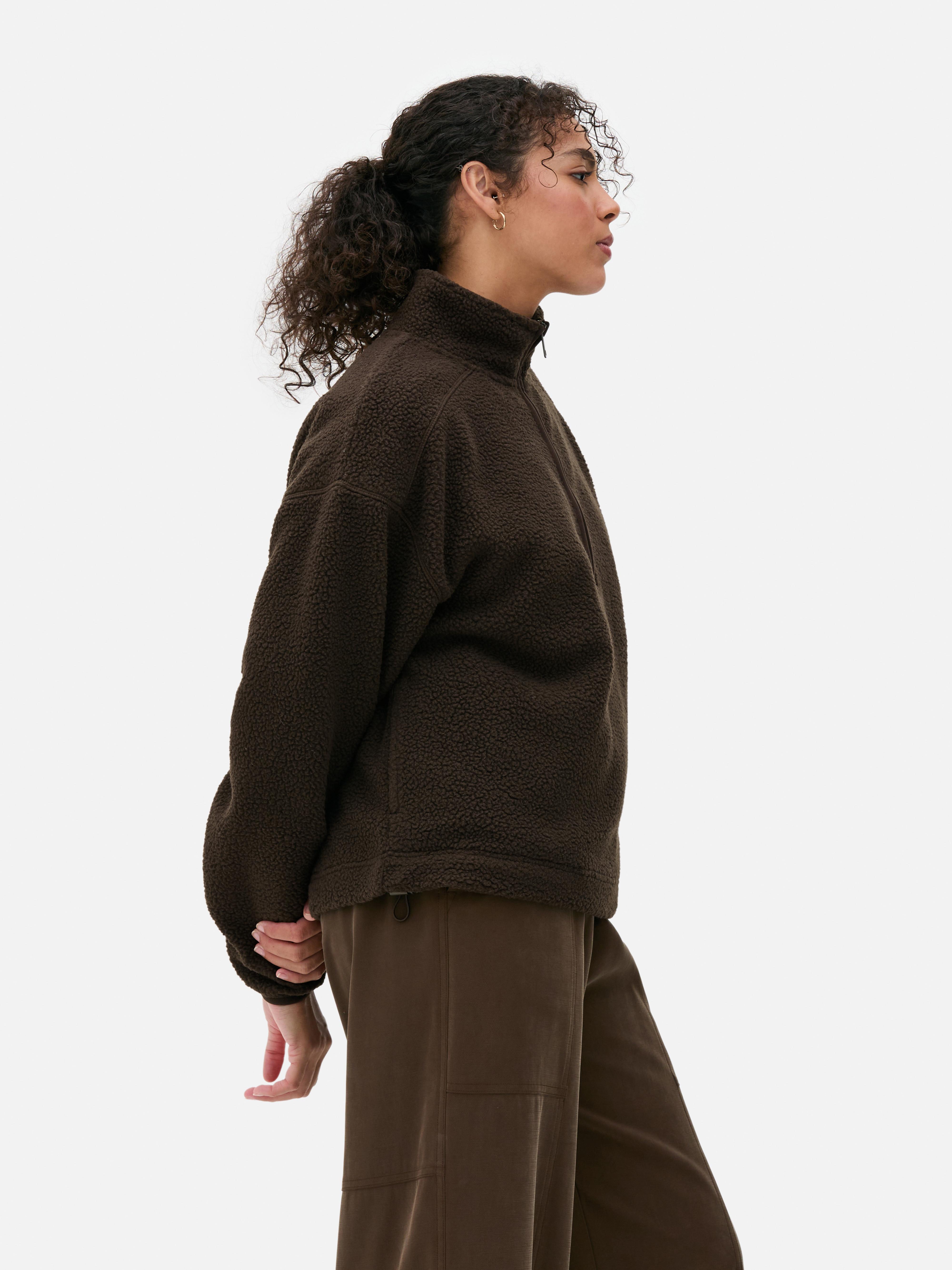 Fleece van borgstof met halve rits