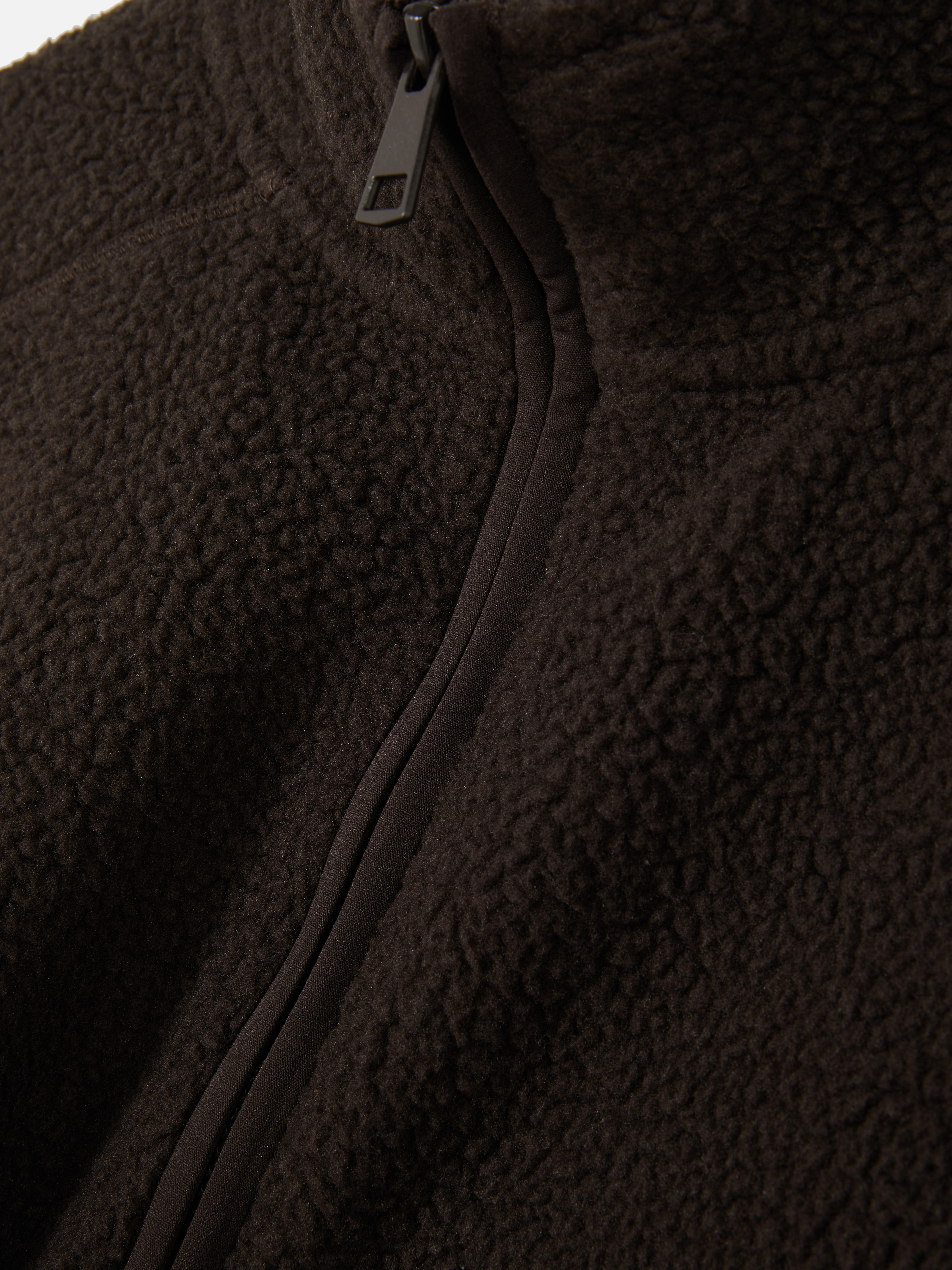 Fleece van borgstof met halve rits