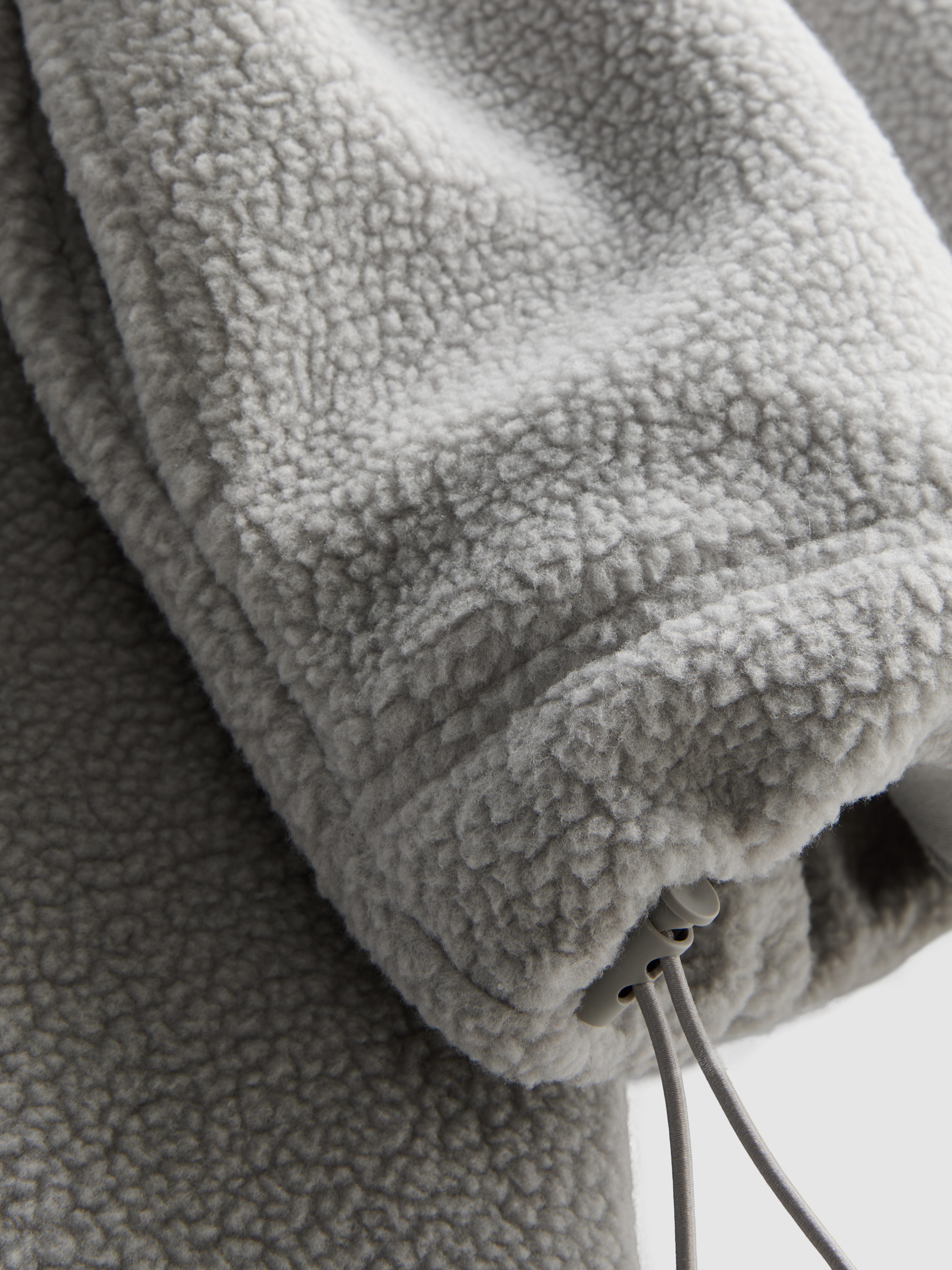 Forro polar de borreguito con media cremallera