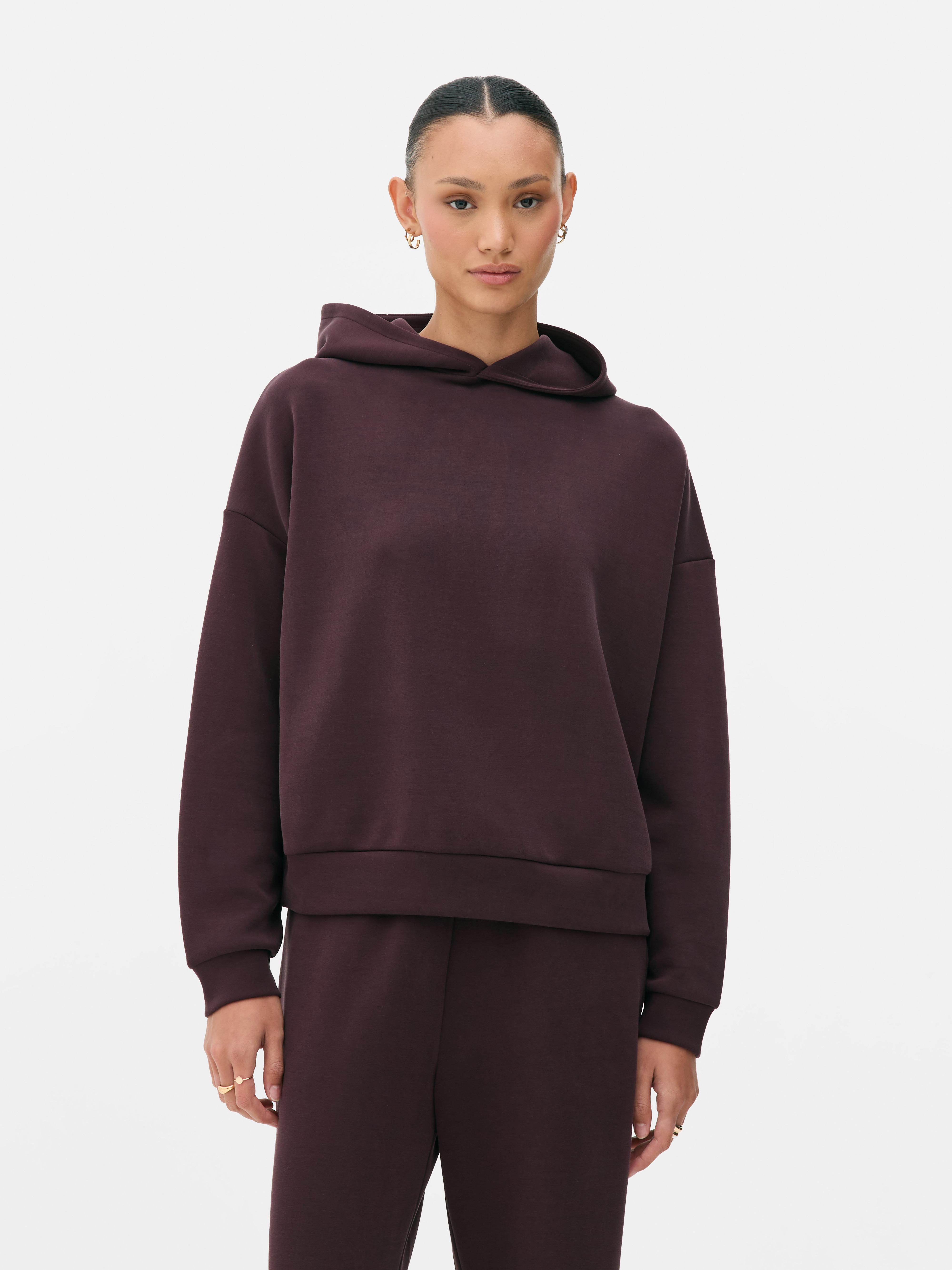 Felpa con cappuccio e spalle scese in cupro