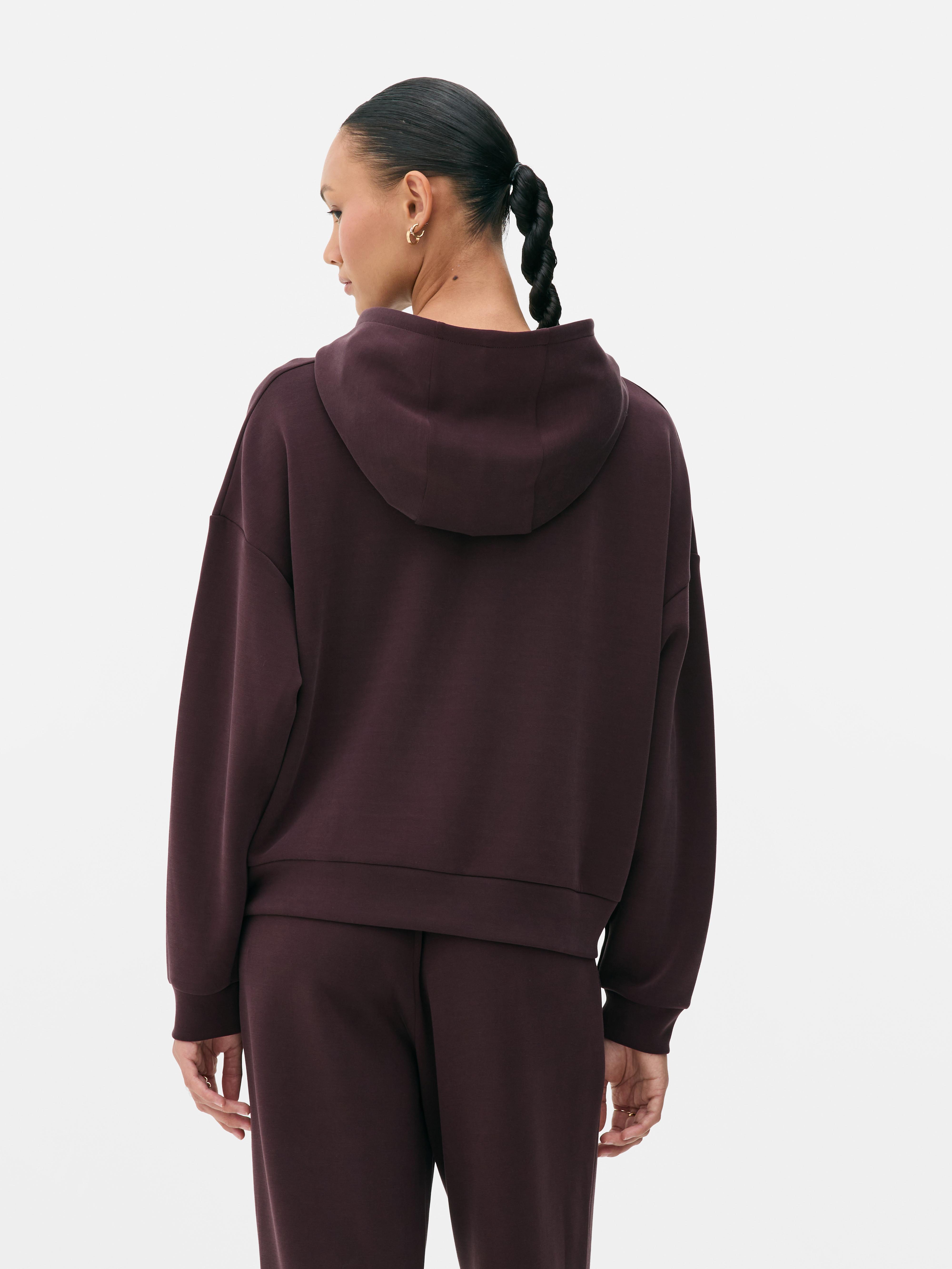 Felpa con cappuccio e spalle scese in cupro