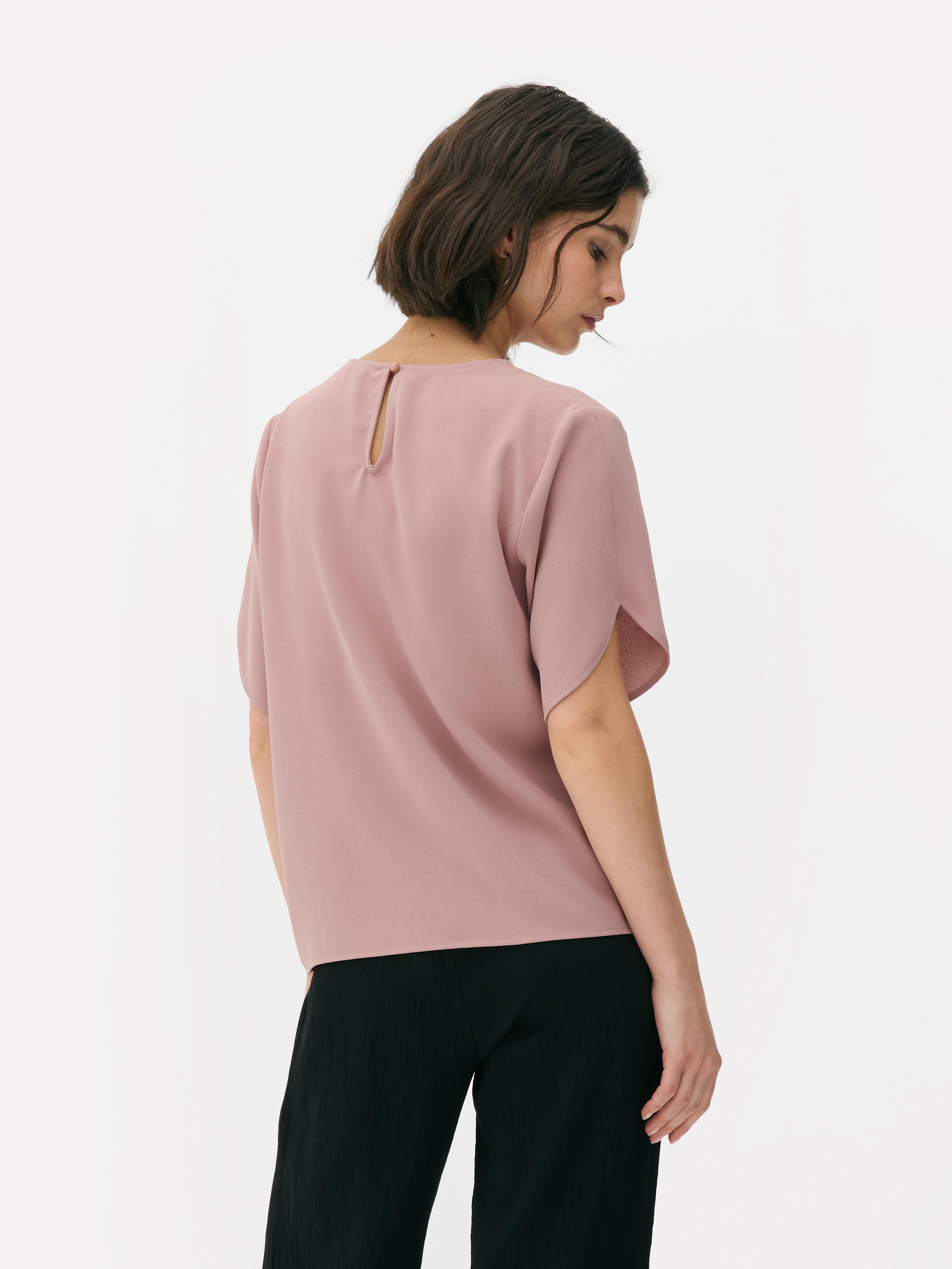 Blusa mangas folgadas