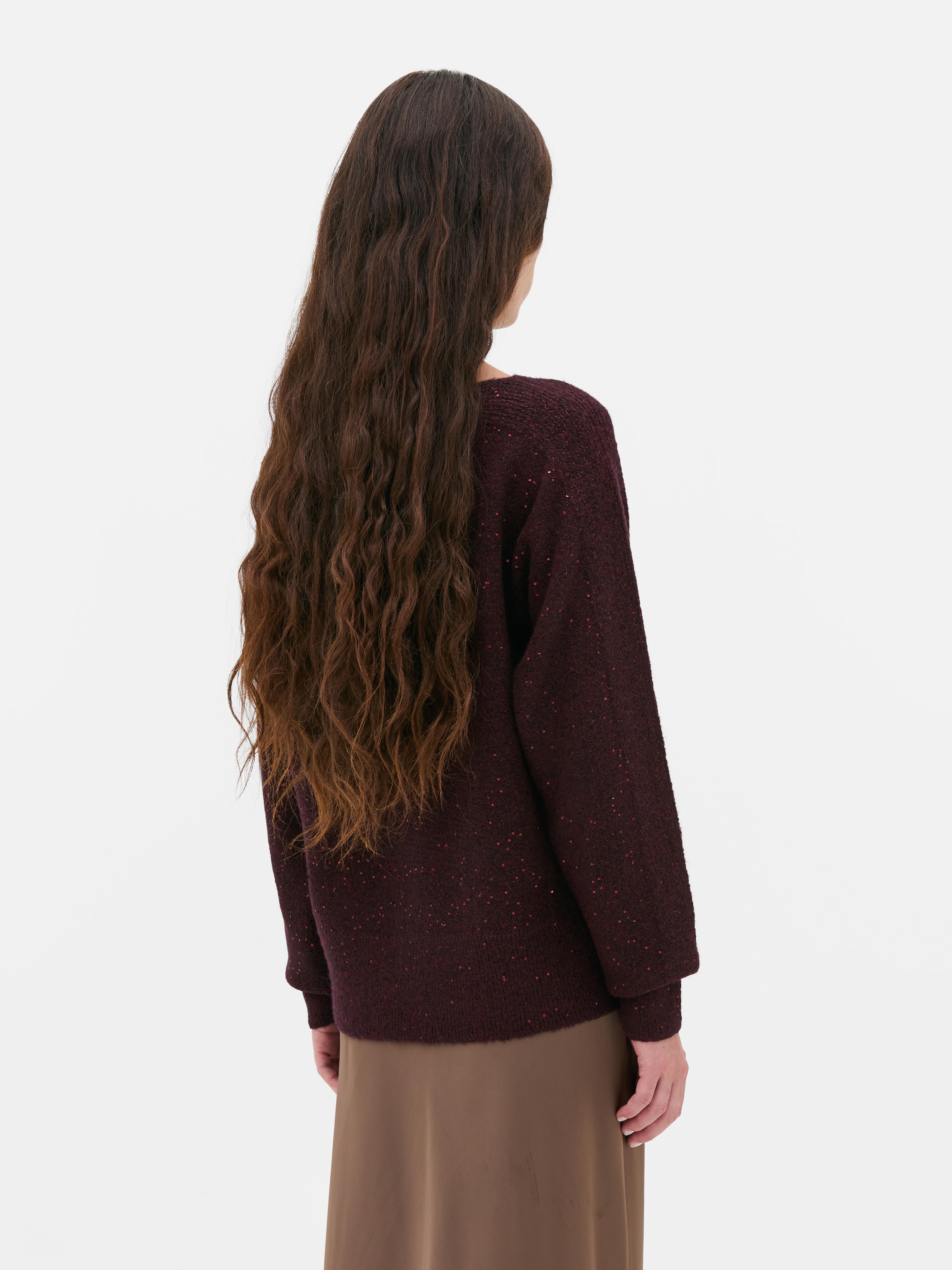 Glitzernder Pullover mit U-Boot-Ausschnitt