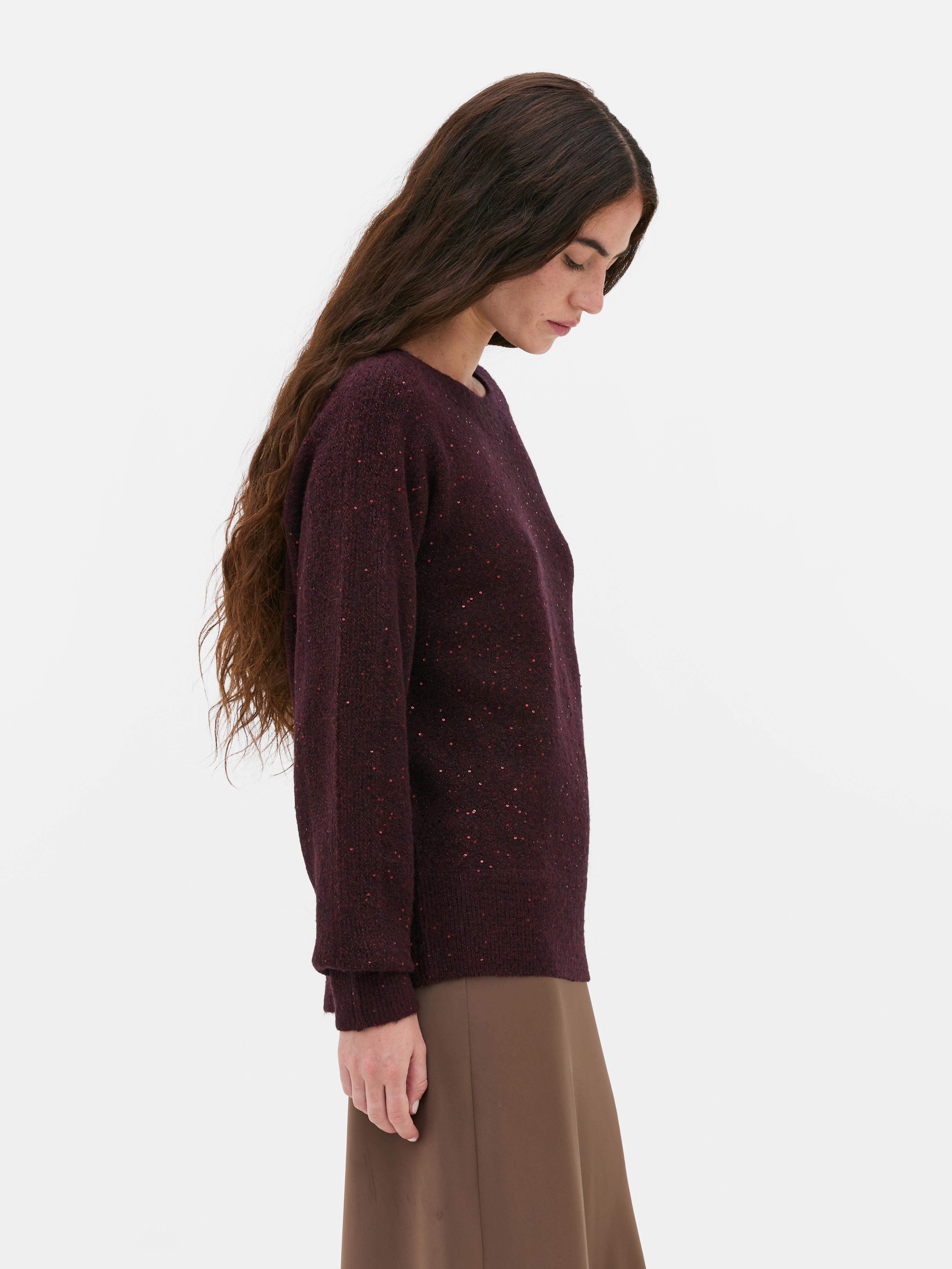 Glitzernder Pullover mit U-Boot-Ausschnitt