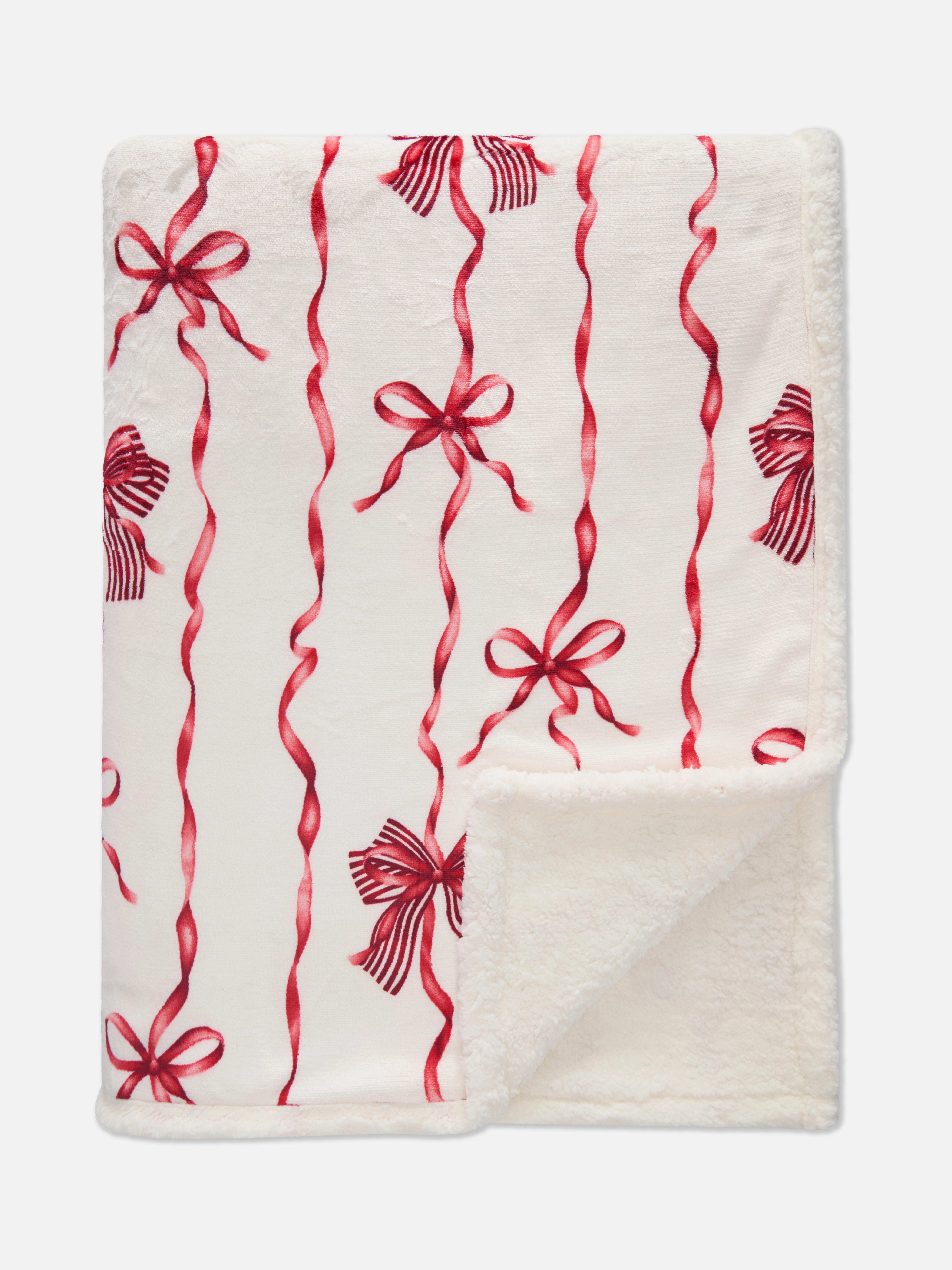 Couverture à motif nœuds et rubans