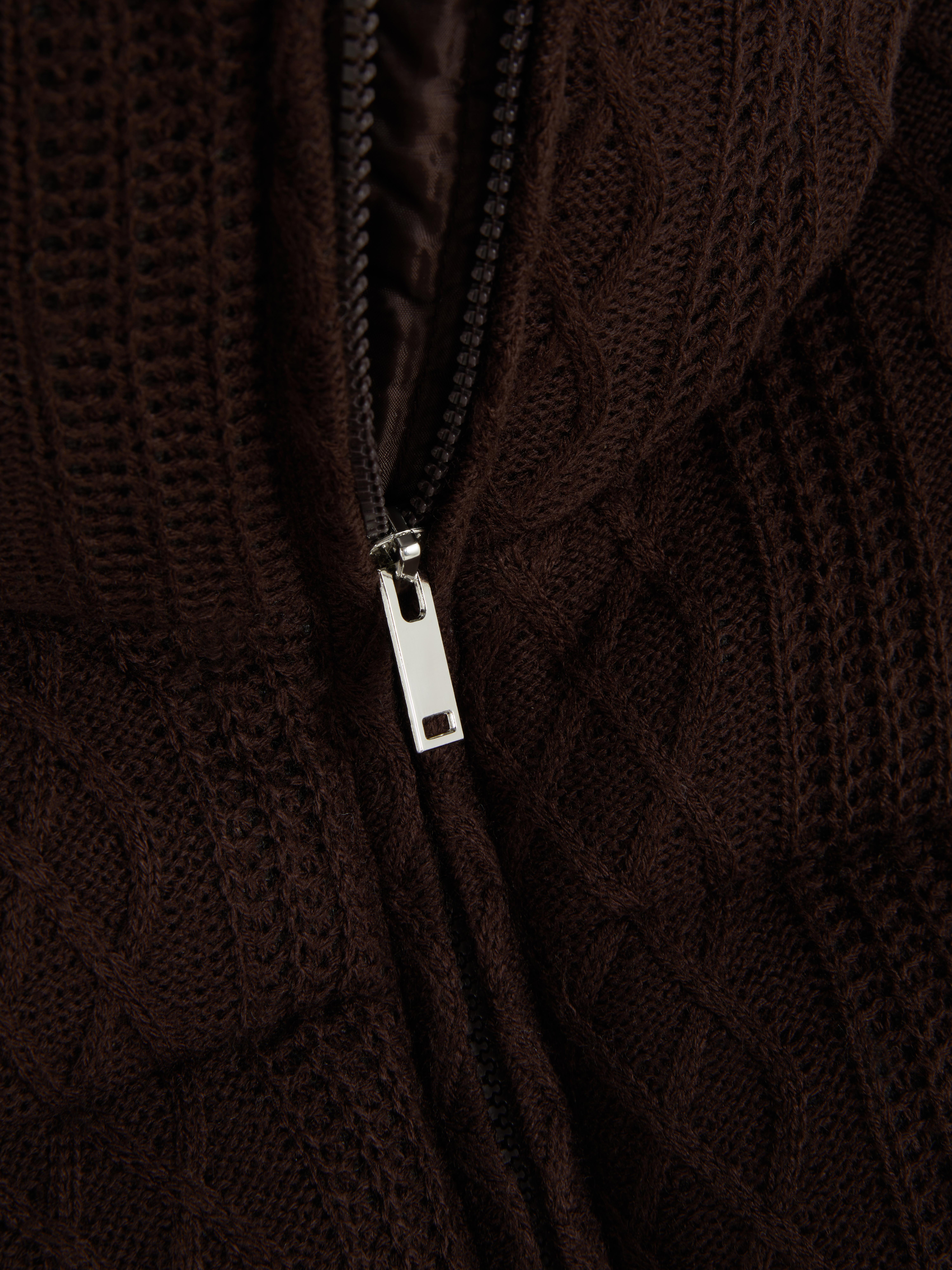 Chaqueta acolchada corta de punto de ochos