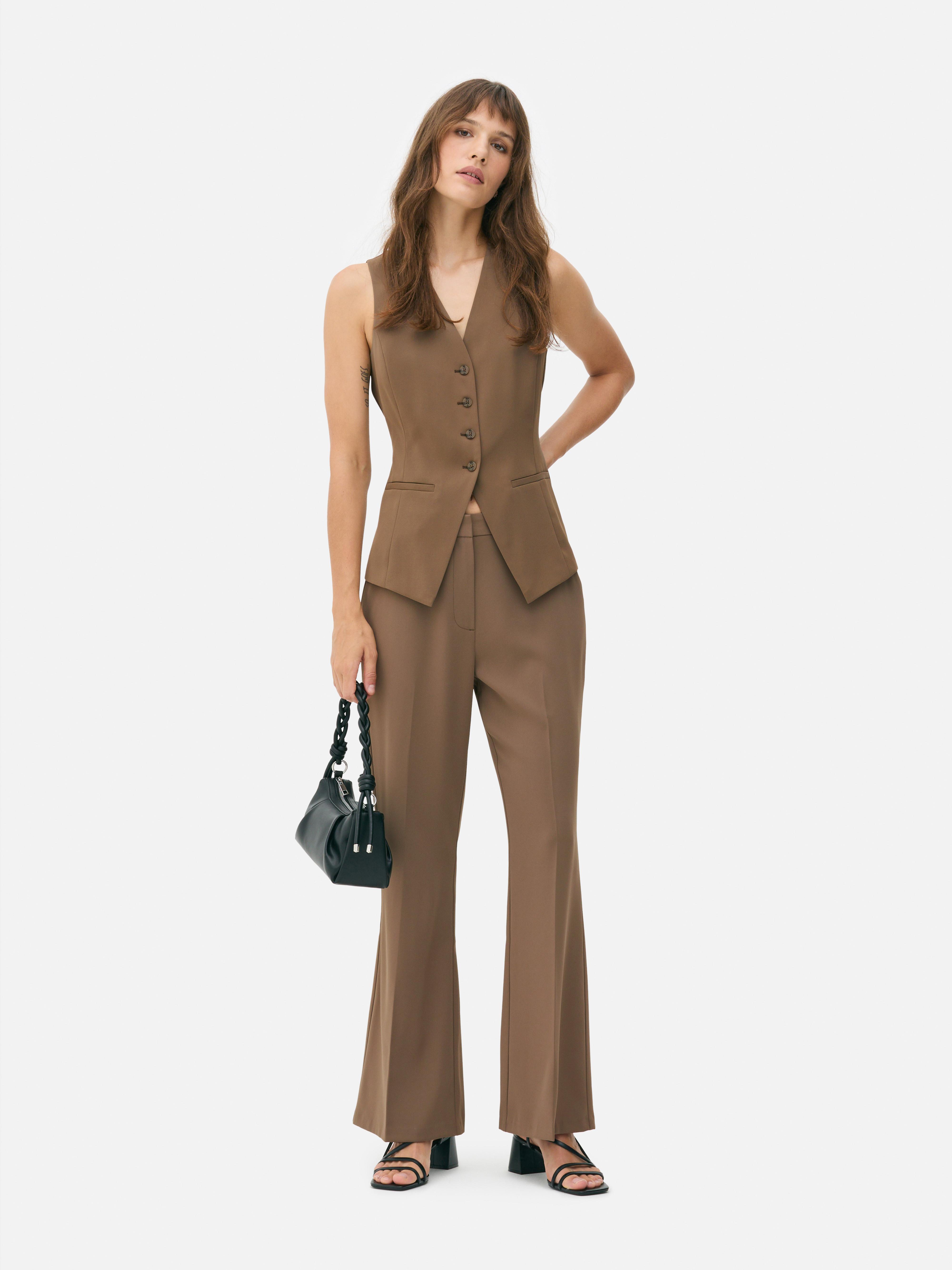 Pantalon ajusté taille mi-haute