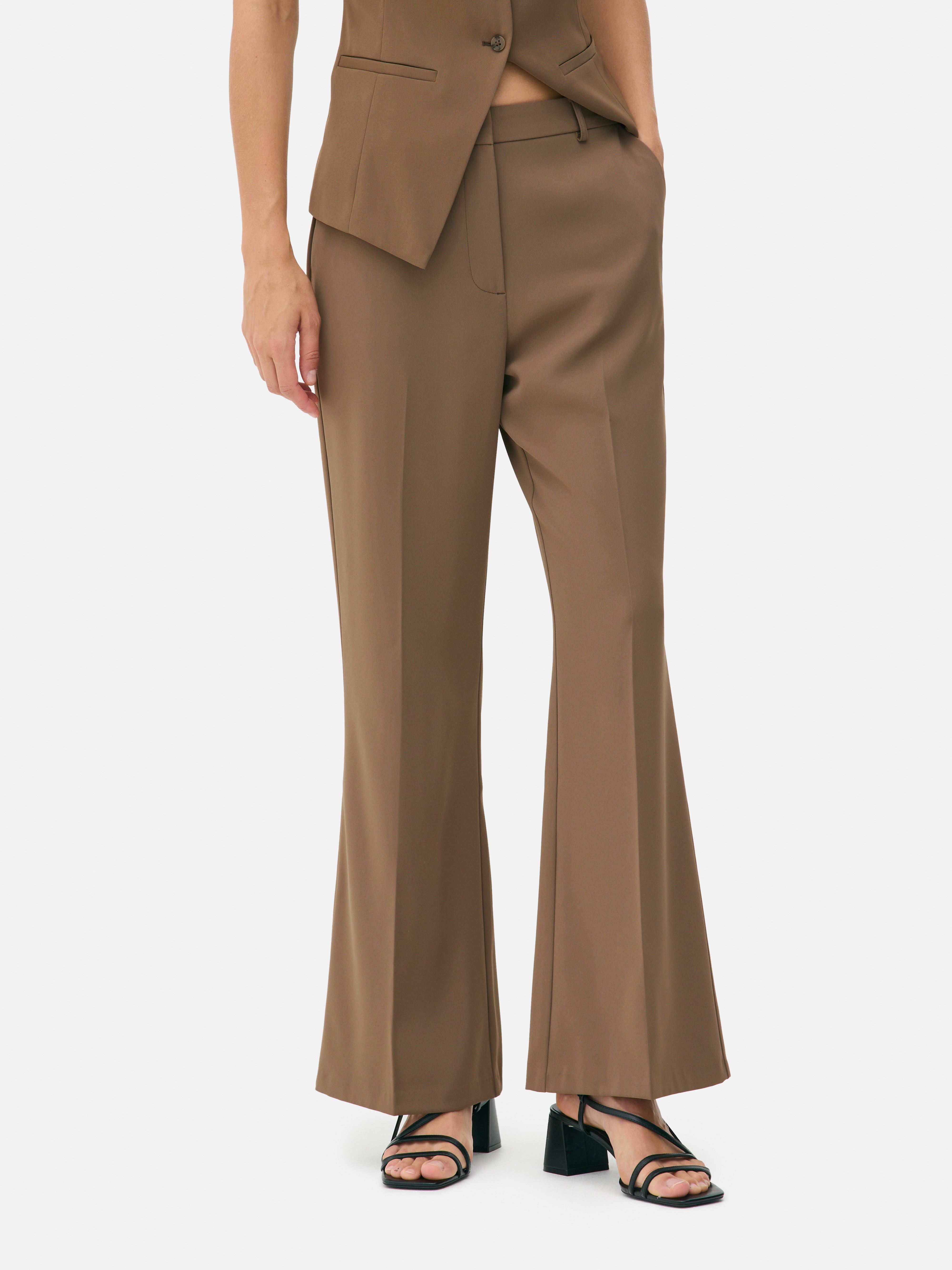 Pantalon ajusté taille mi-haute