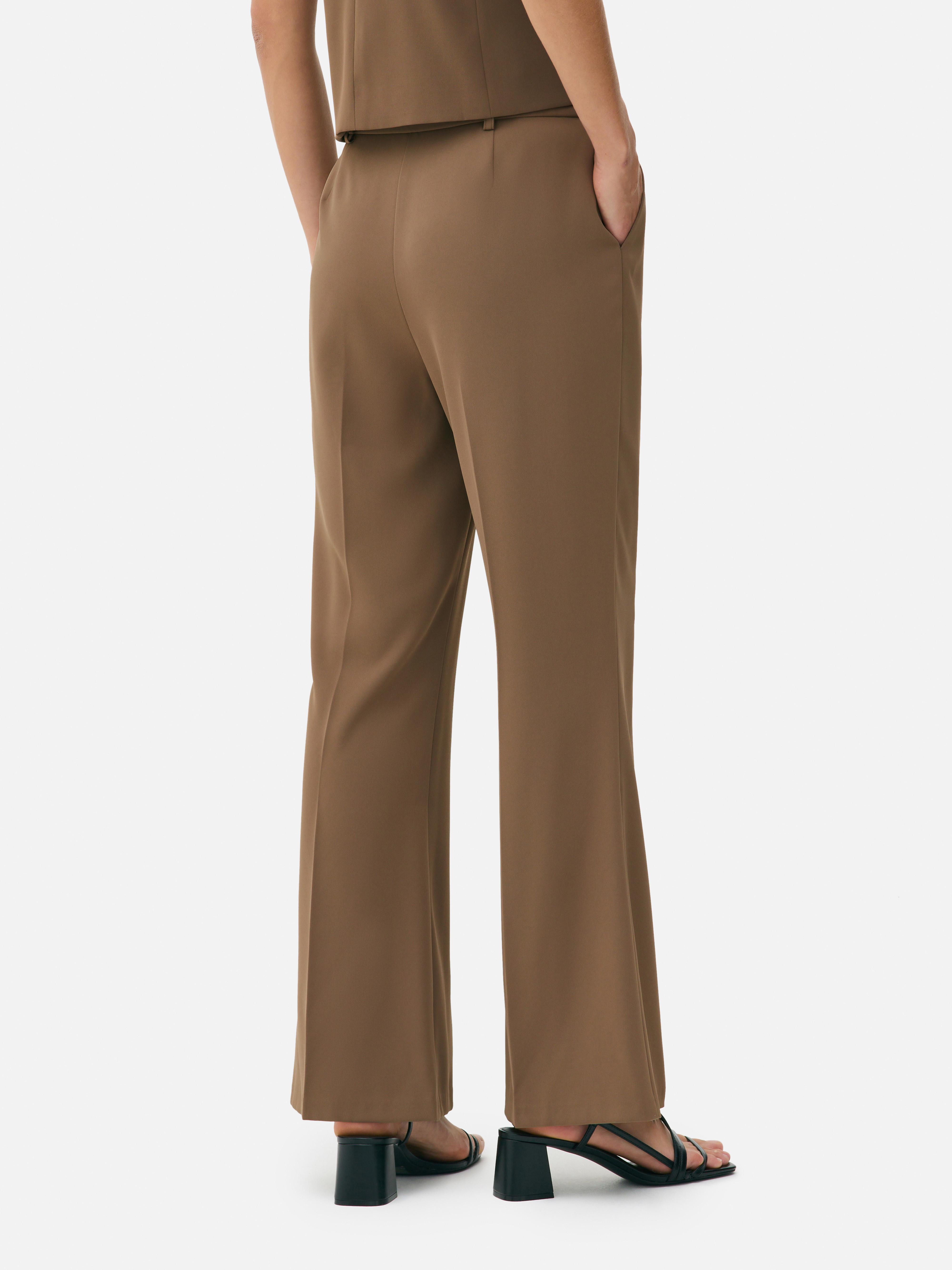 Pantalon ajusté taille mi-haute