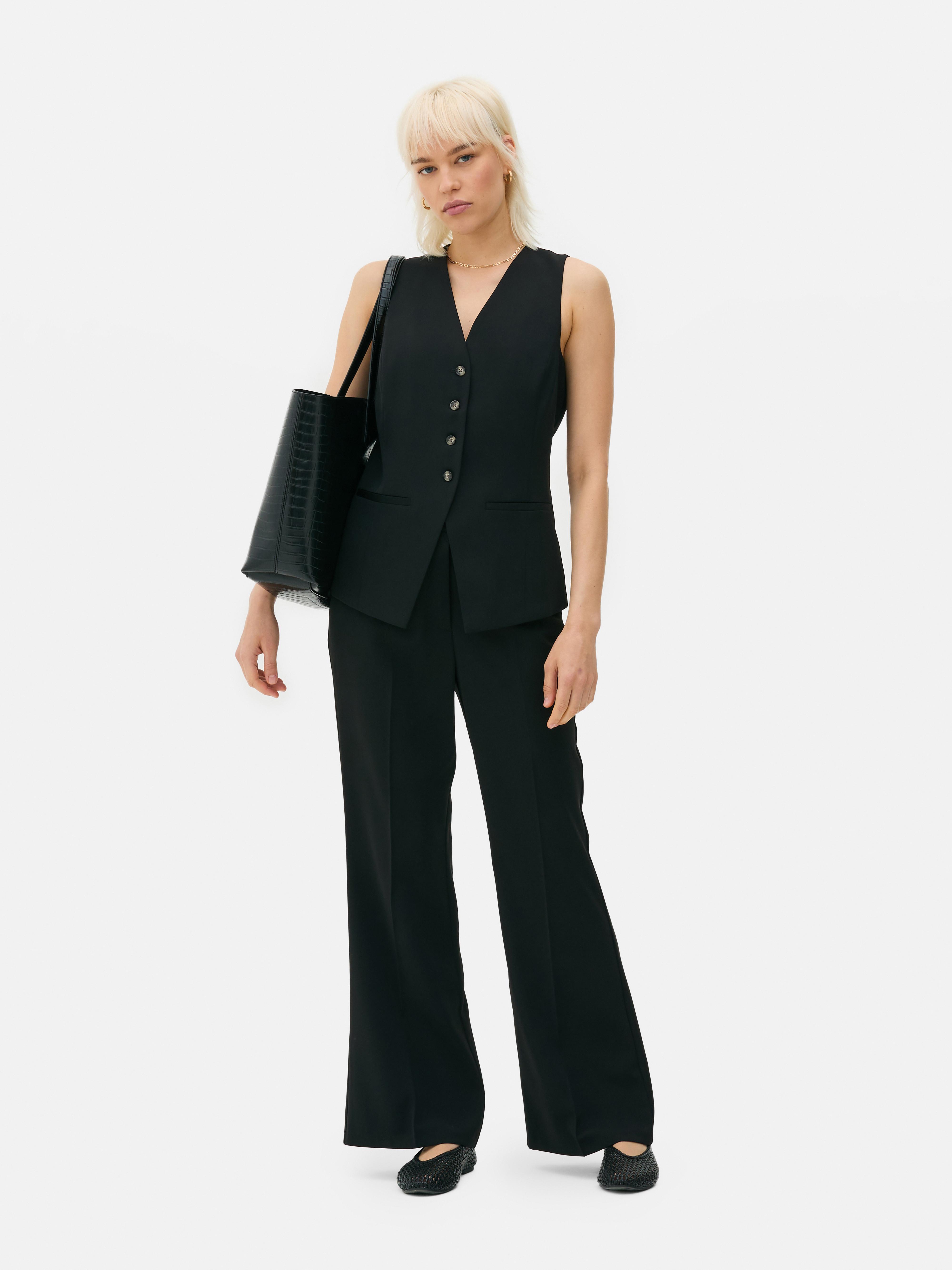 Pantalon ajusté taille mi-haute