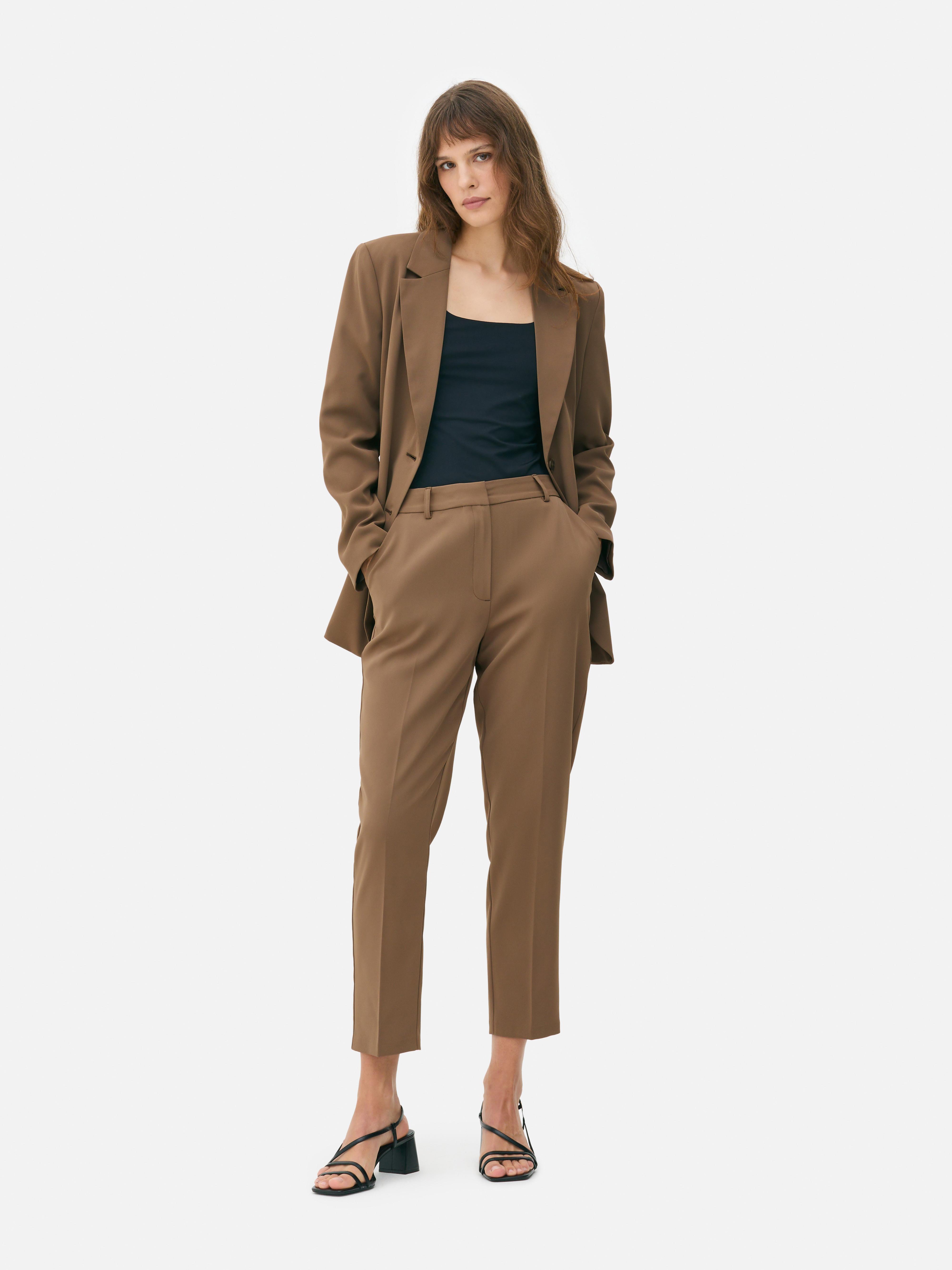 Pantalones pitillo tobilleros Café