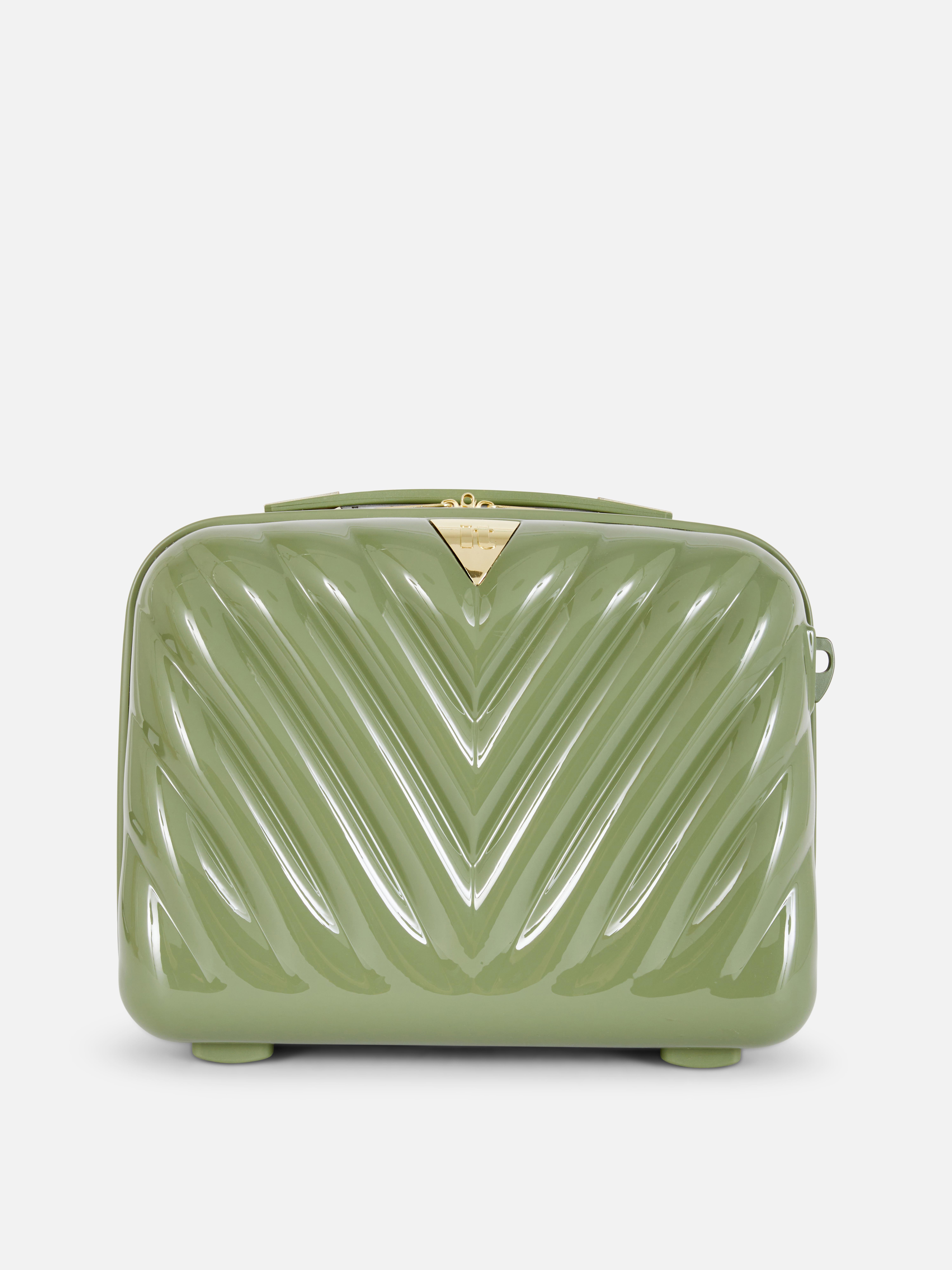 Skořepinová kosmetická kazeta It Luggage s klínovým vzorem