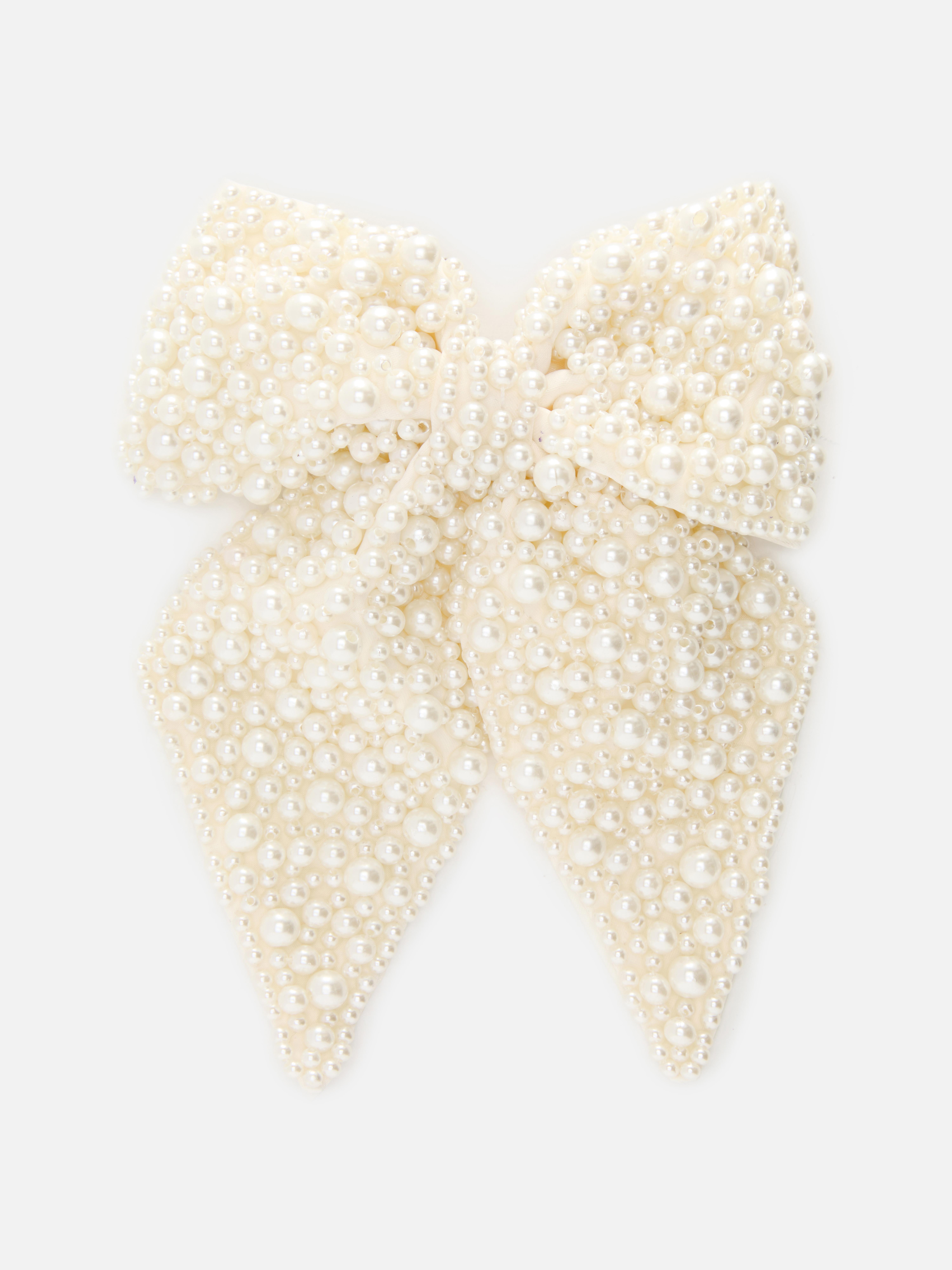 Barrette nœud en fausses perles