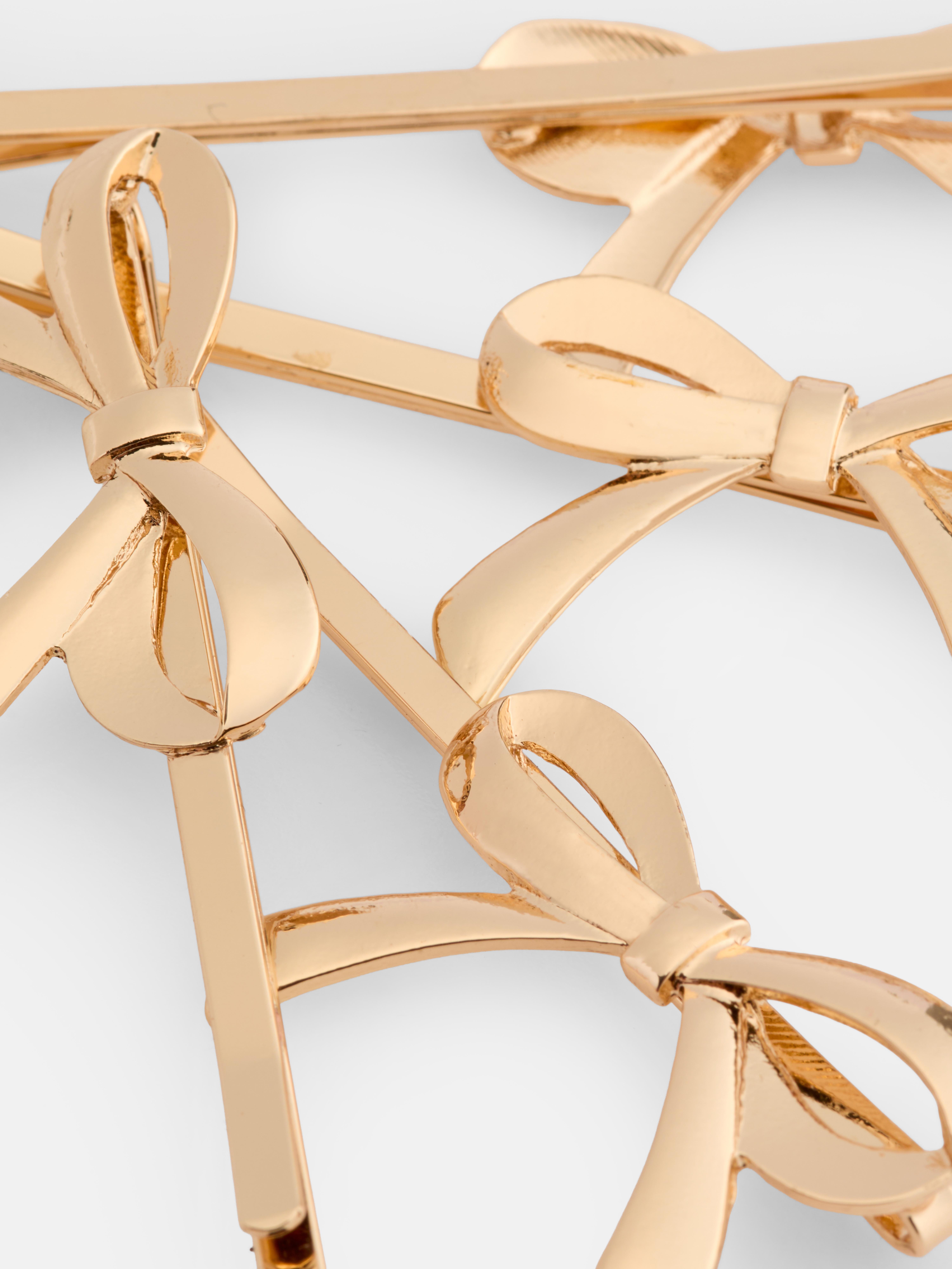 Lot de 4 barrettes à nœud