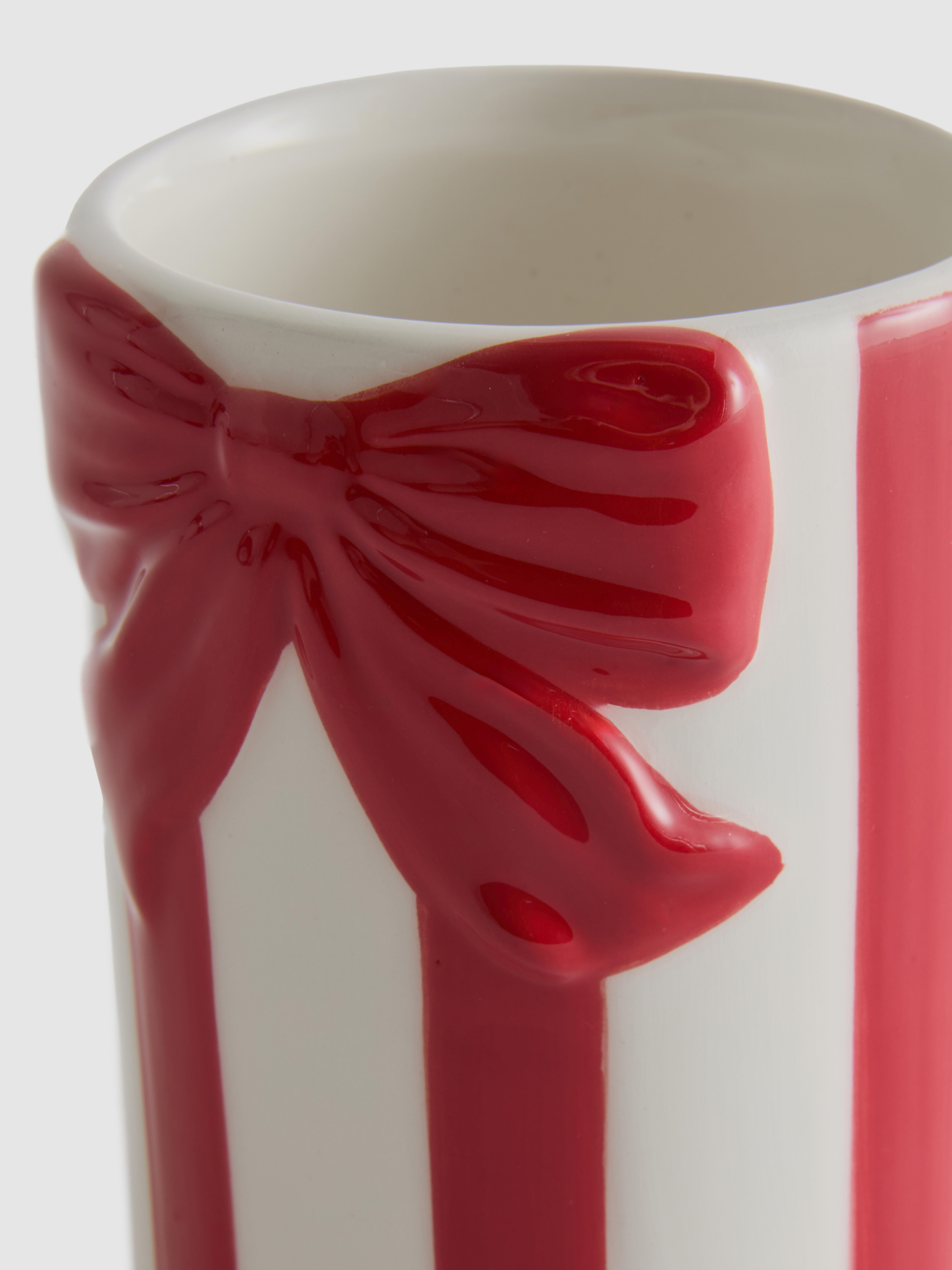 Badkamerbeker met kerststrik