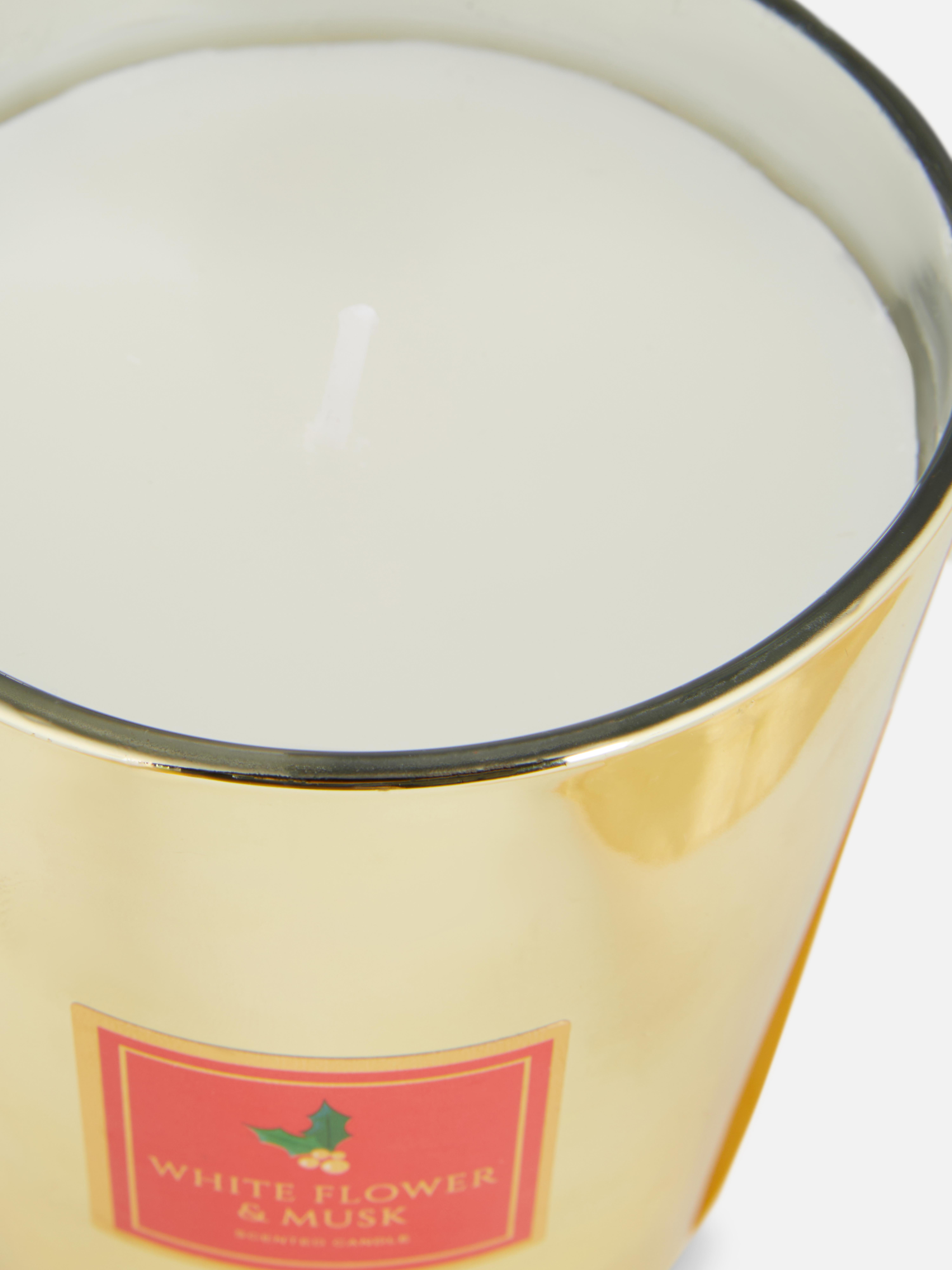Weihnachtliche Duftkerze in Glas in Metallic-Optik