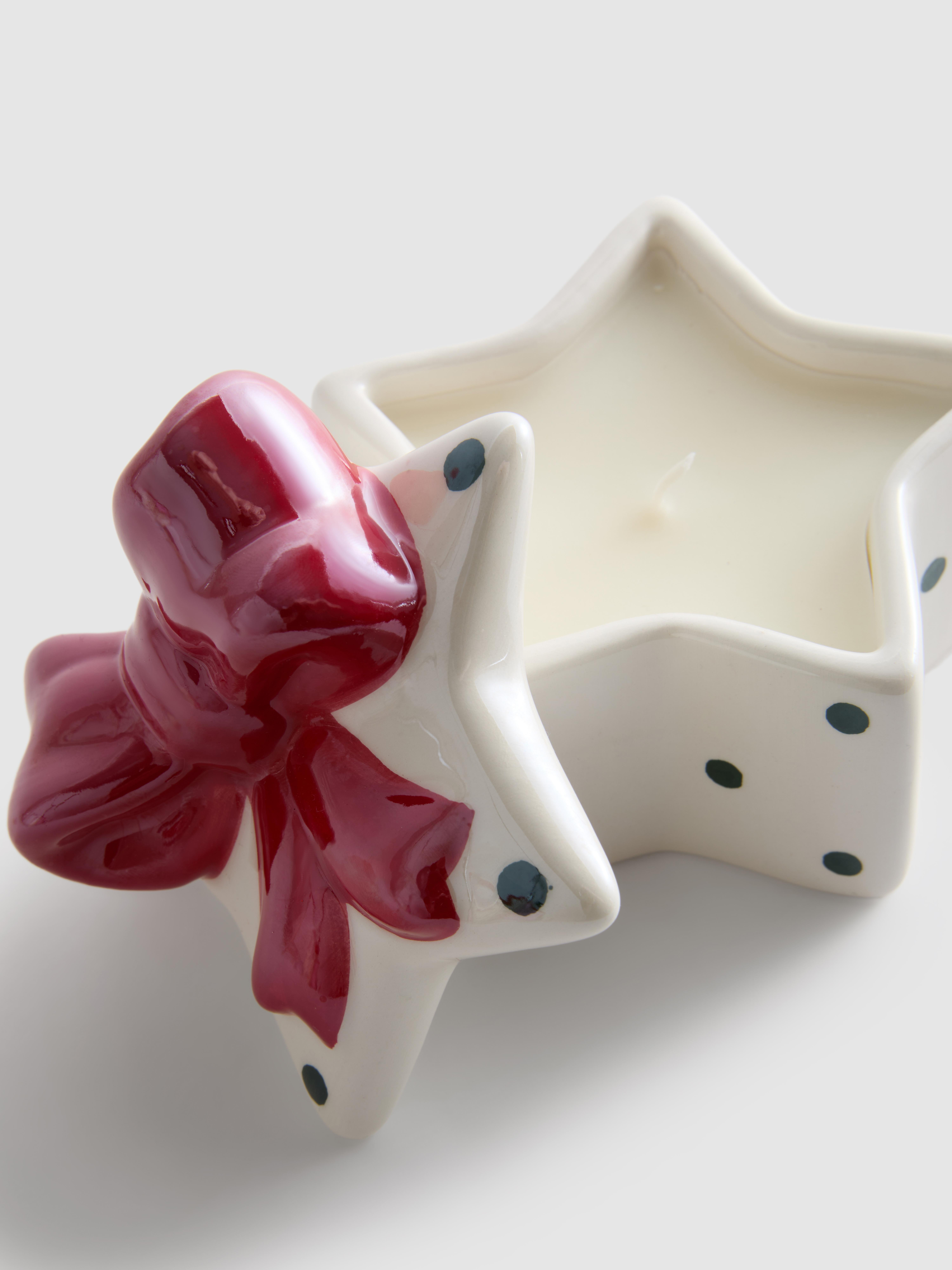 Vela aromática en tarro con forma de estrella