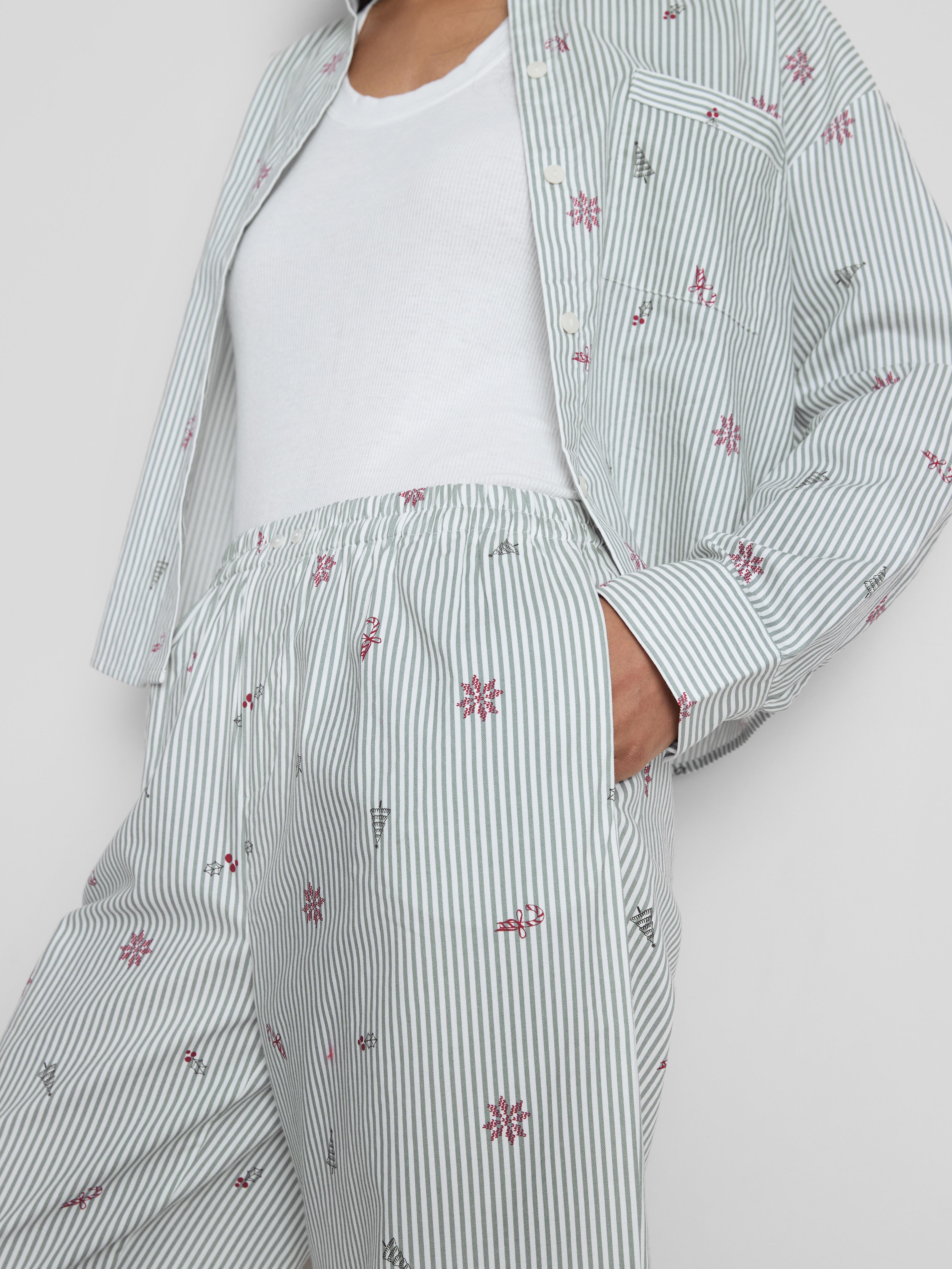 Gestreepte pyjamabroek in kerstthema