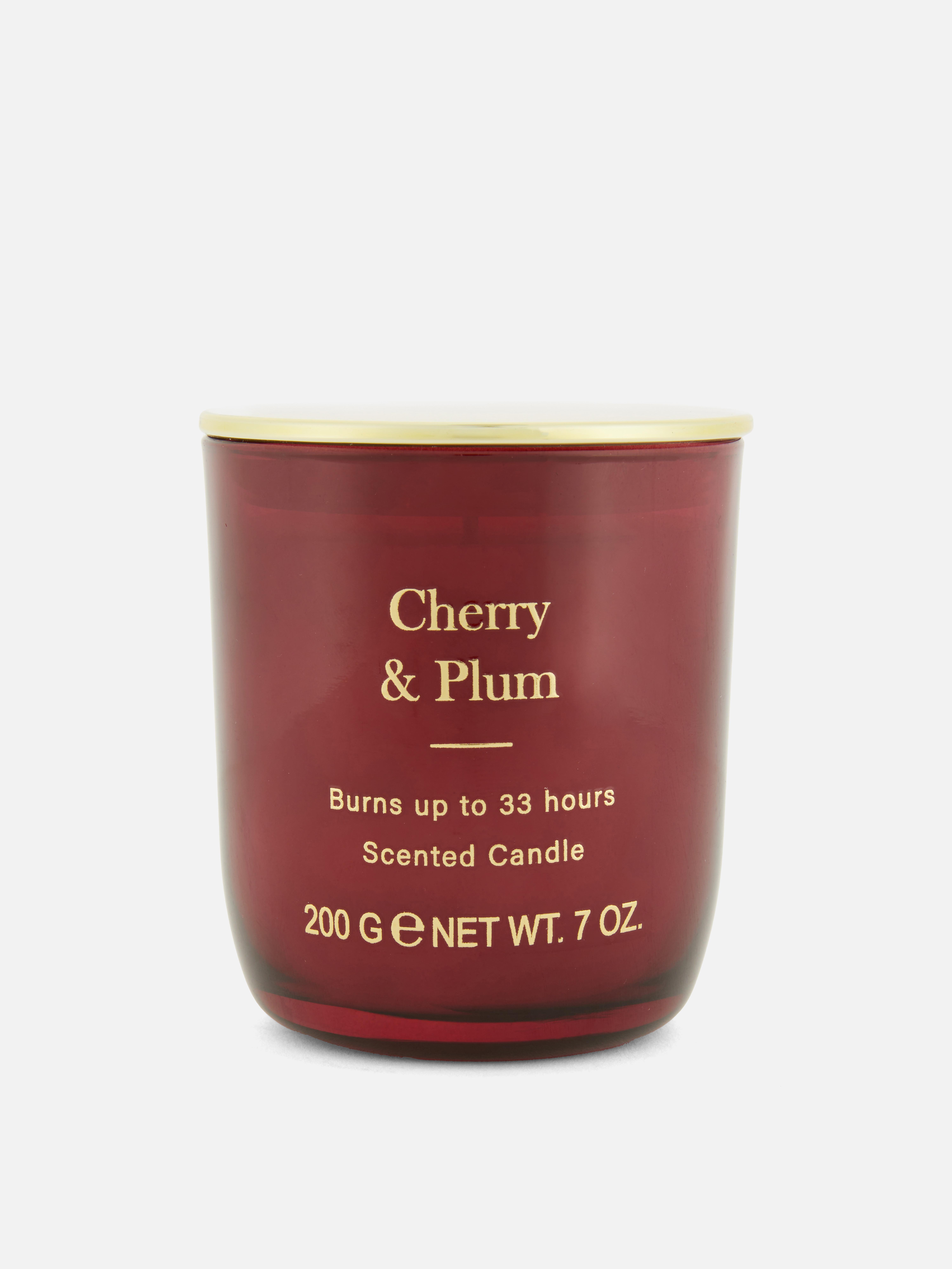 Bougie parfumée dans un pot à couvercle métallique