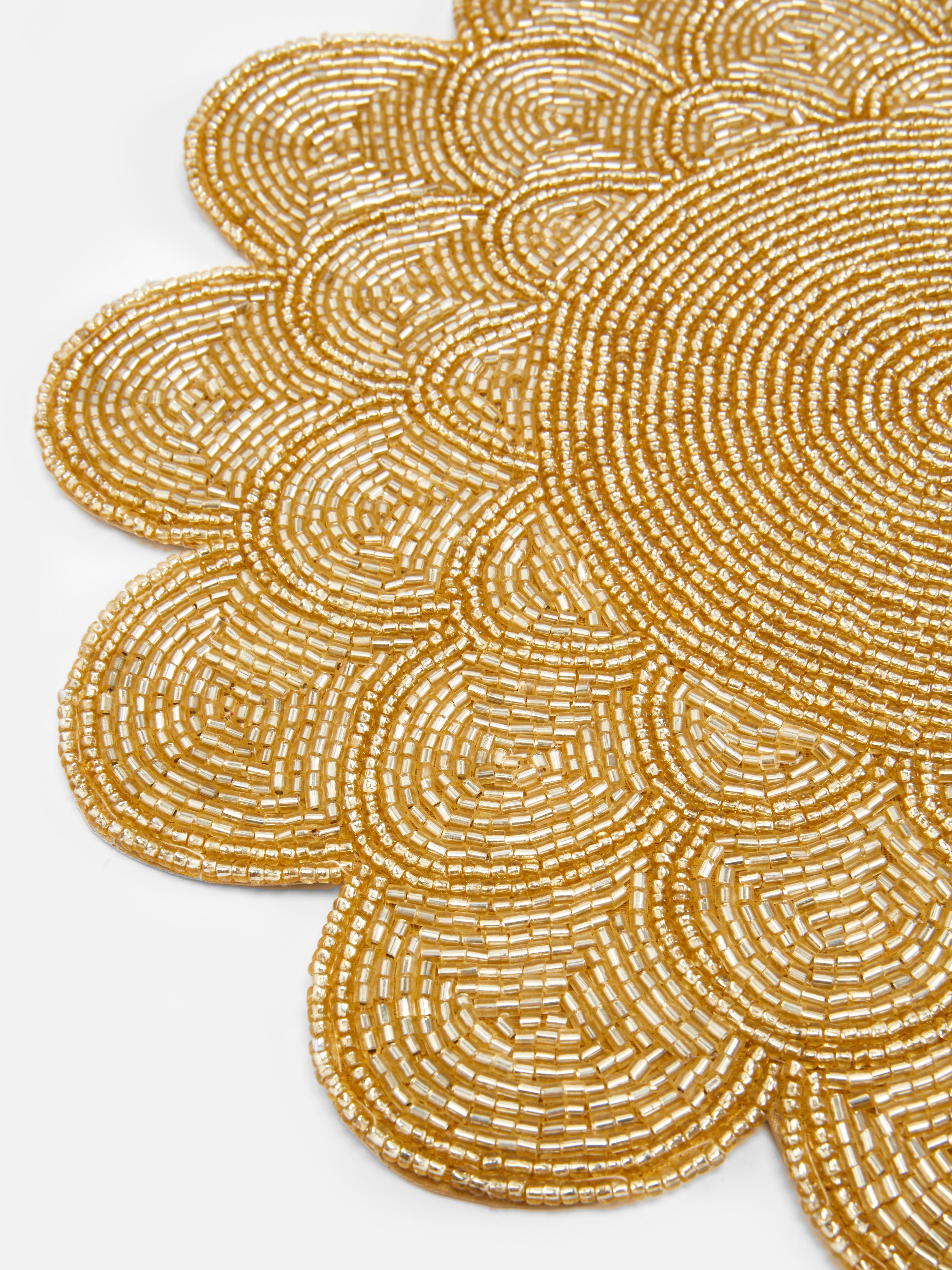 Salvamanteles con cuentas de The Edit