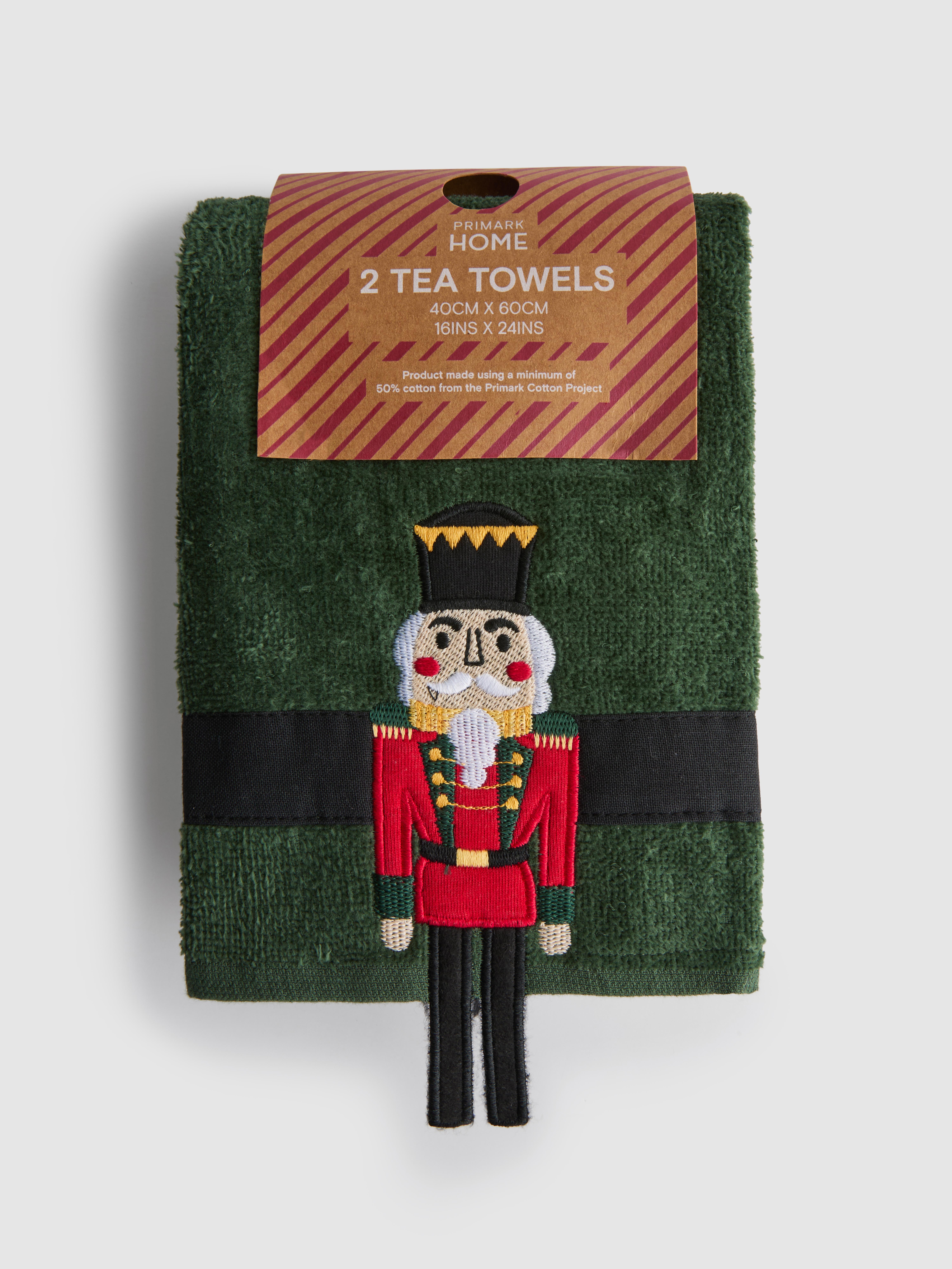 2 prosoape de bucătărie cu modele inedite de Crăciun