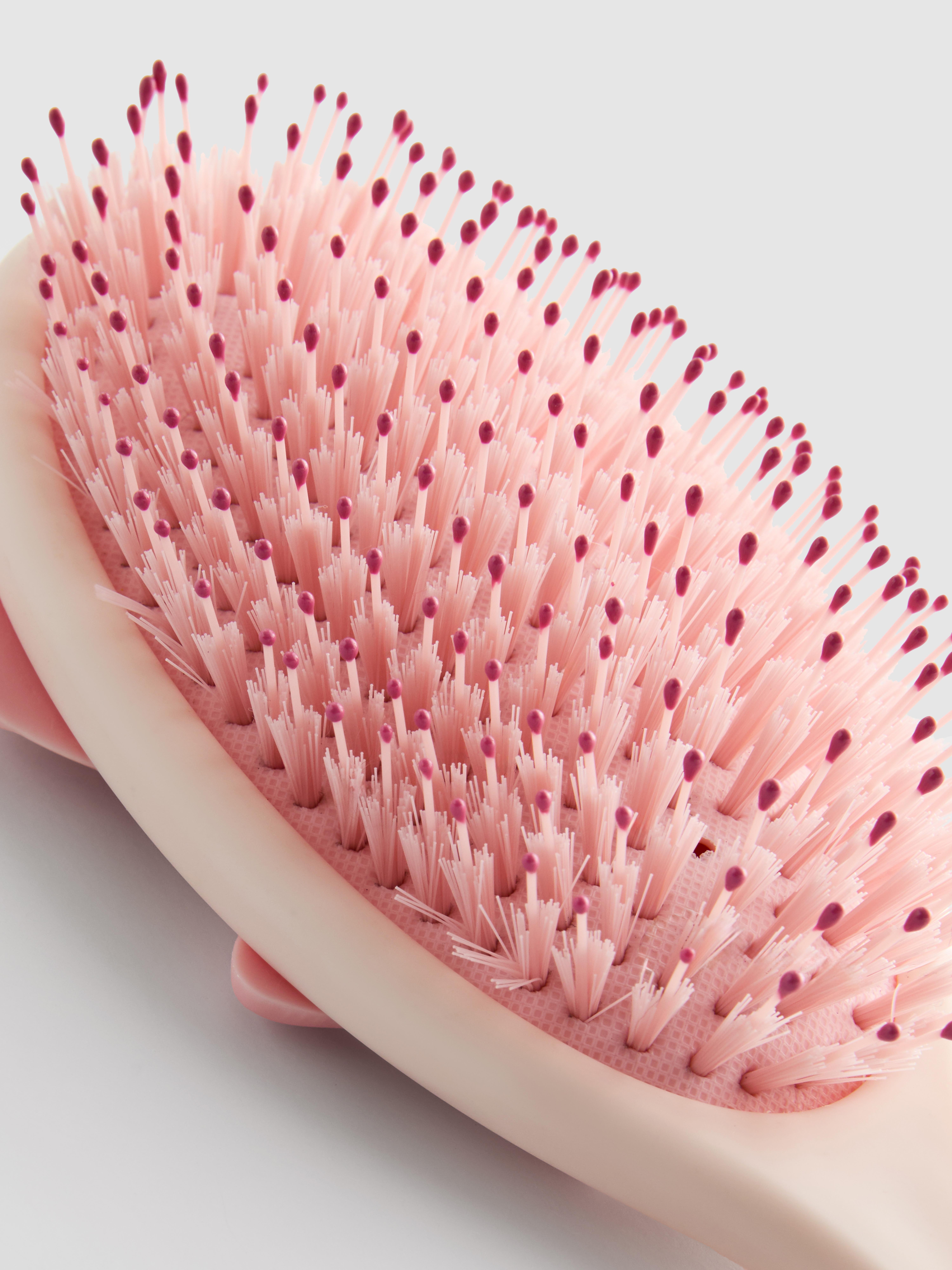 PS... Glättende Haarbürste mit Schleifenprint