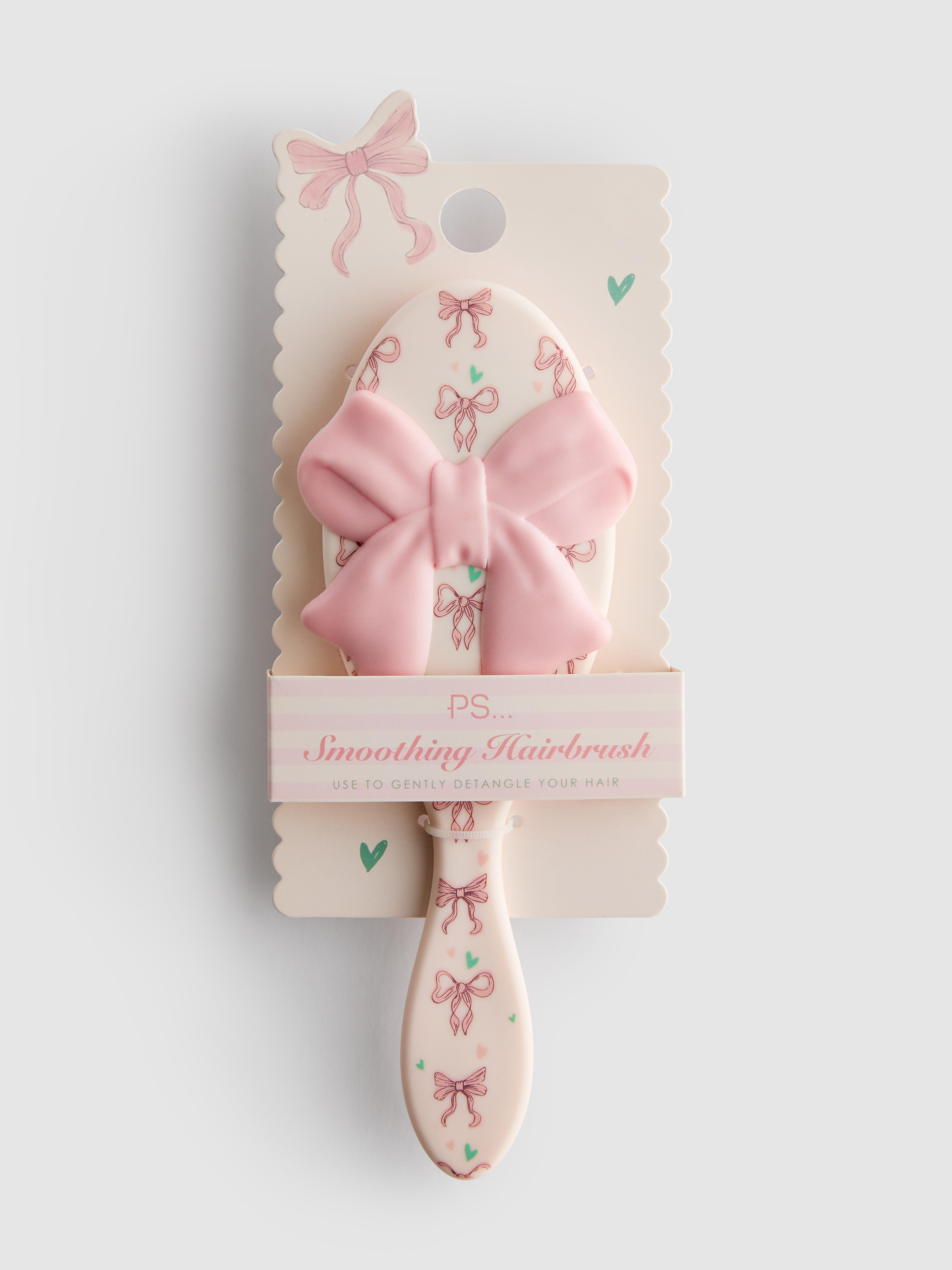 PS... Glättende Haarbürste mit Schleifenprint