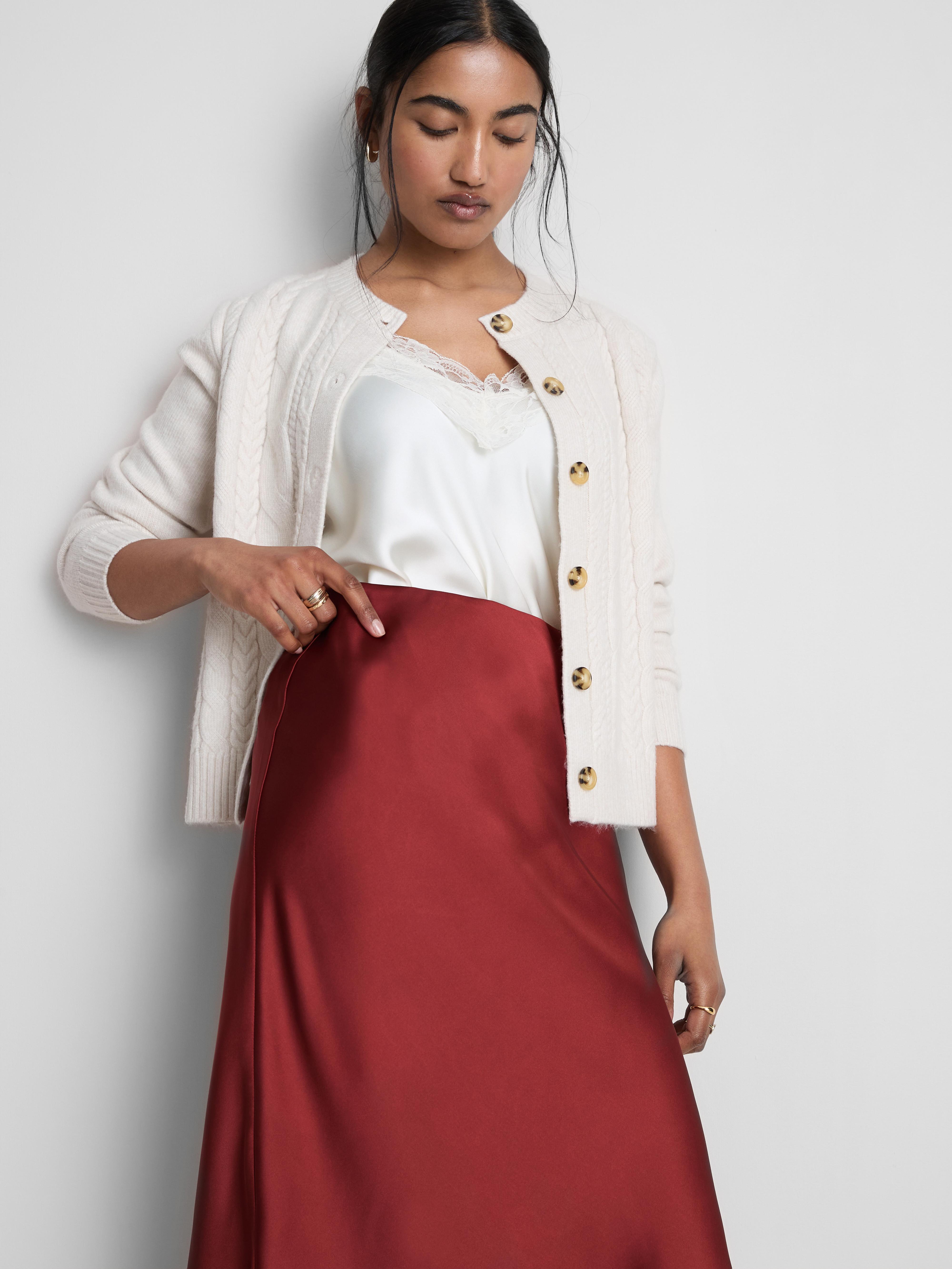 Casaco gola redonda malha entrançada