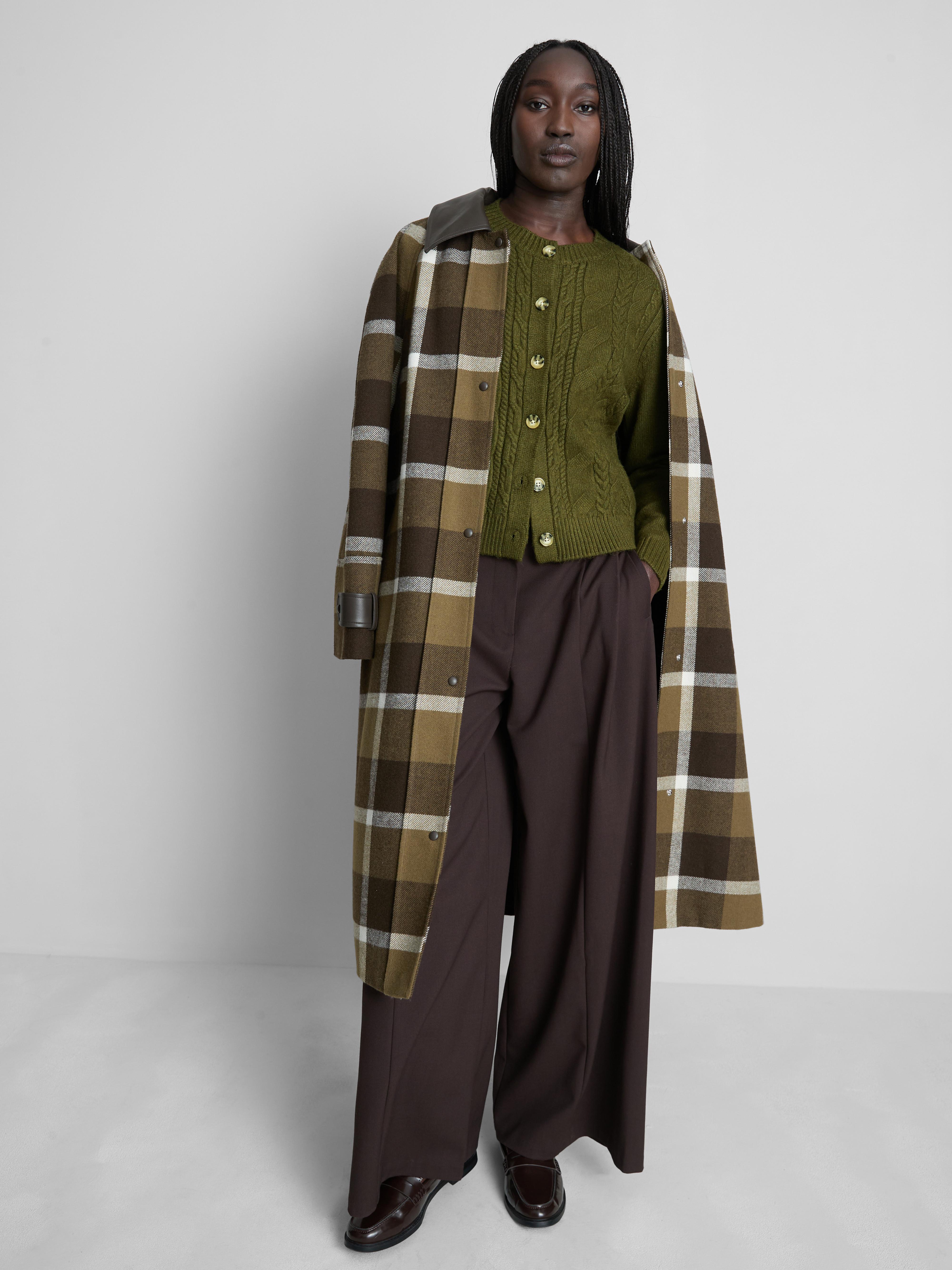 Casaco gola redonda malha entrançada