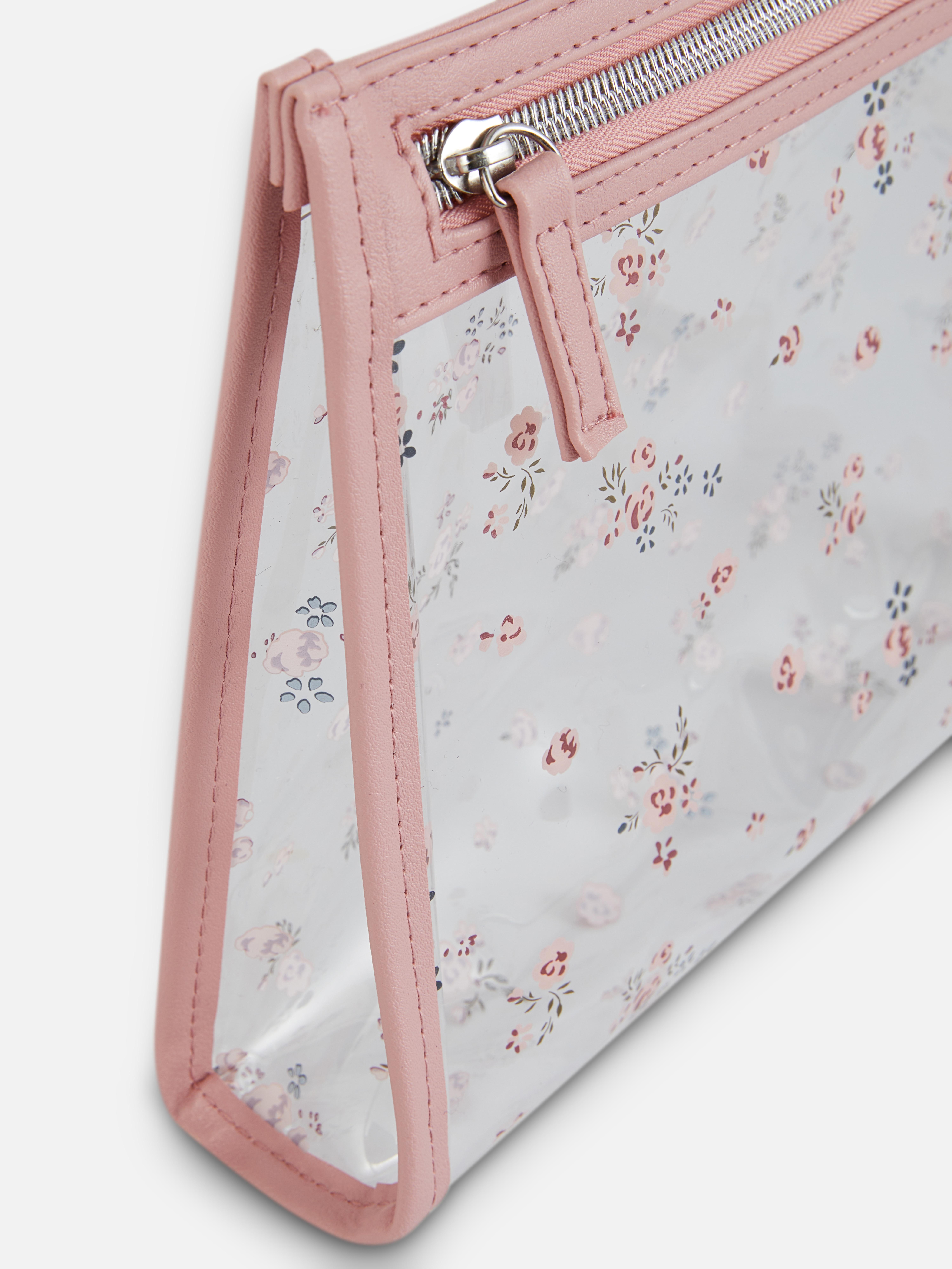 Trousse à maquillage transparente à motif floral