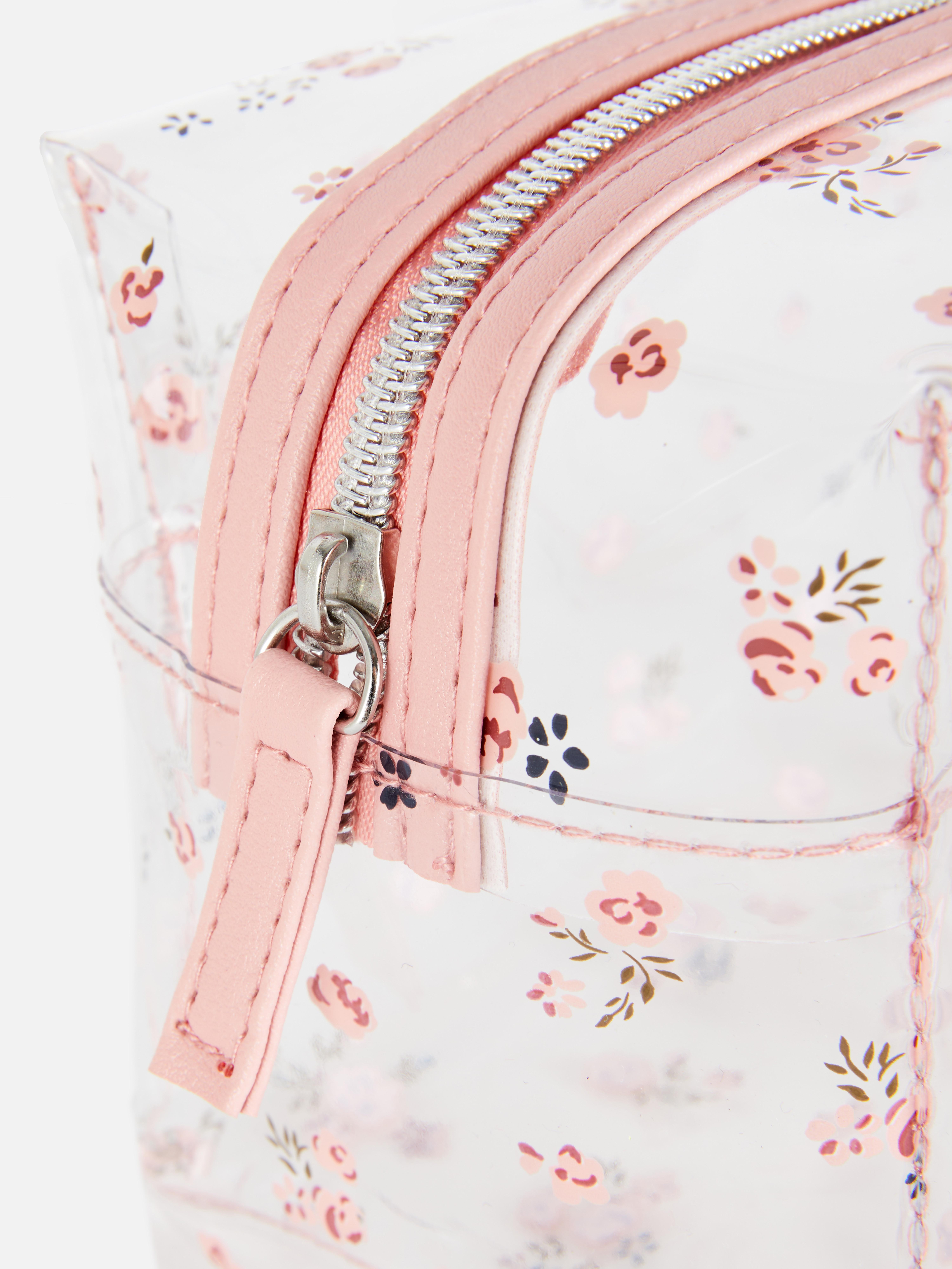 Trousse à maquillage transparente à motif floral