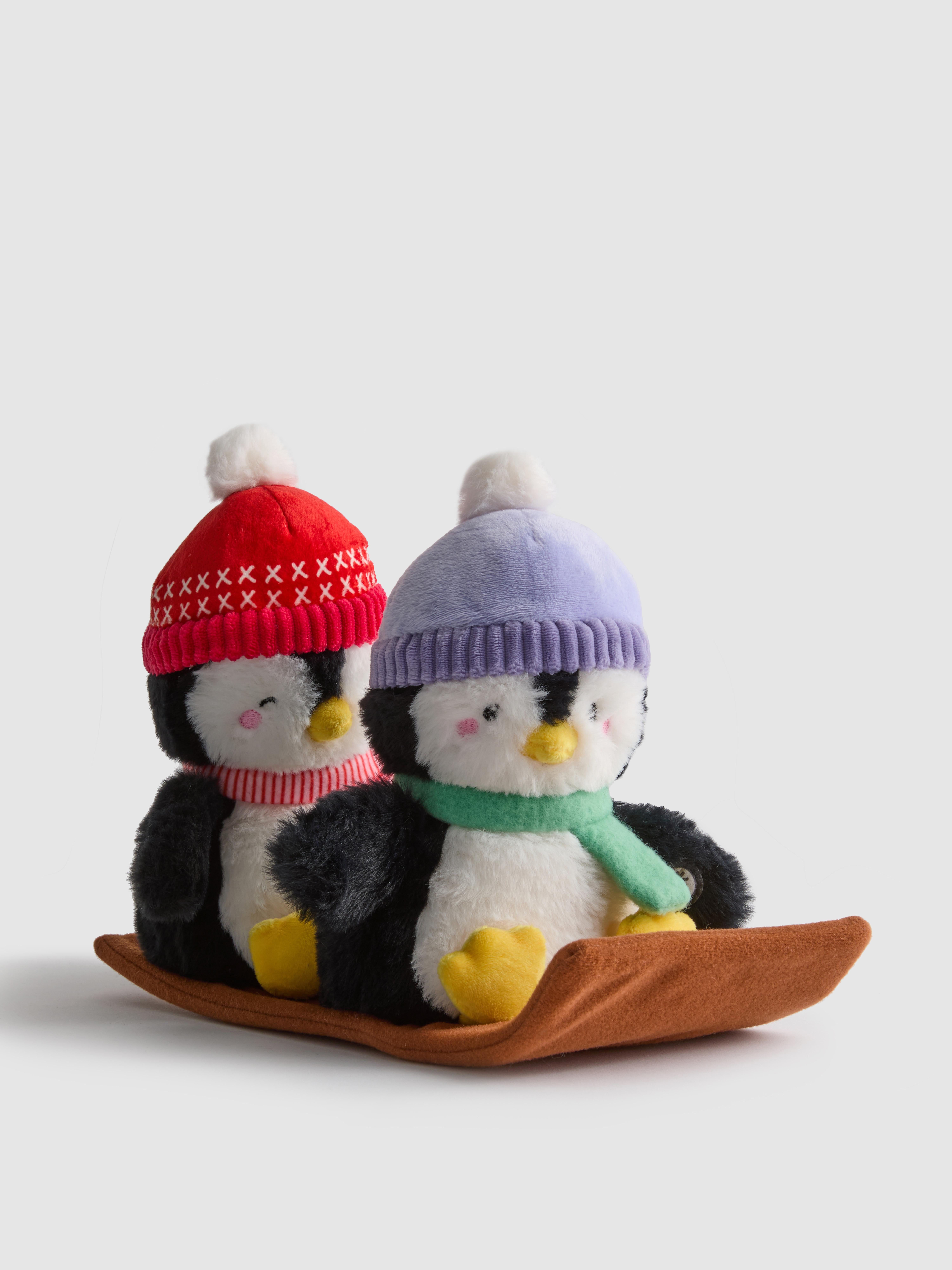 Jucărie de Crăciun cu pinguini pe sanie