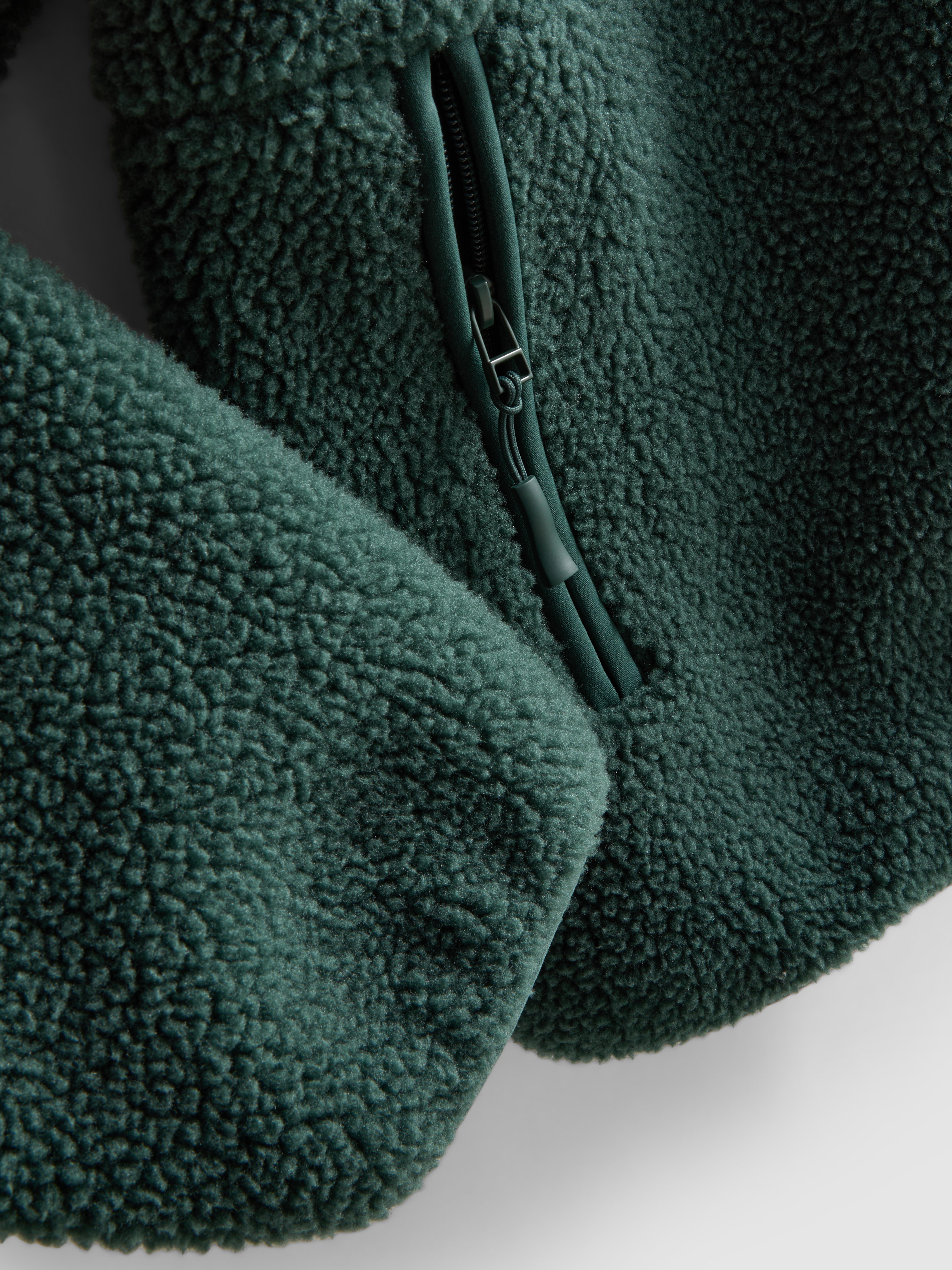 Kożuszkowy polar z zapięciem na suwak 1/2