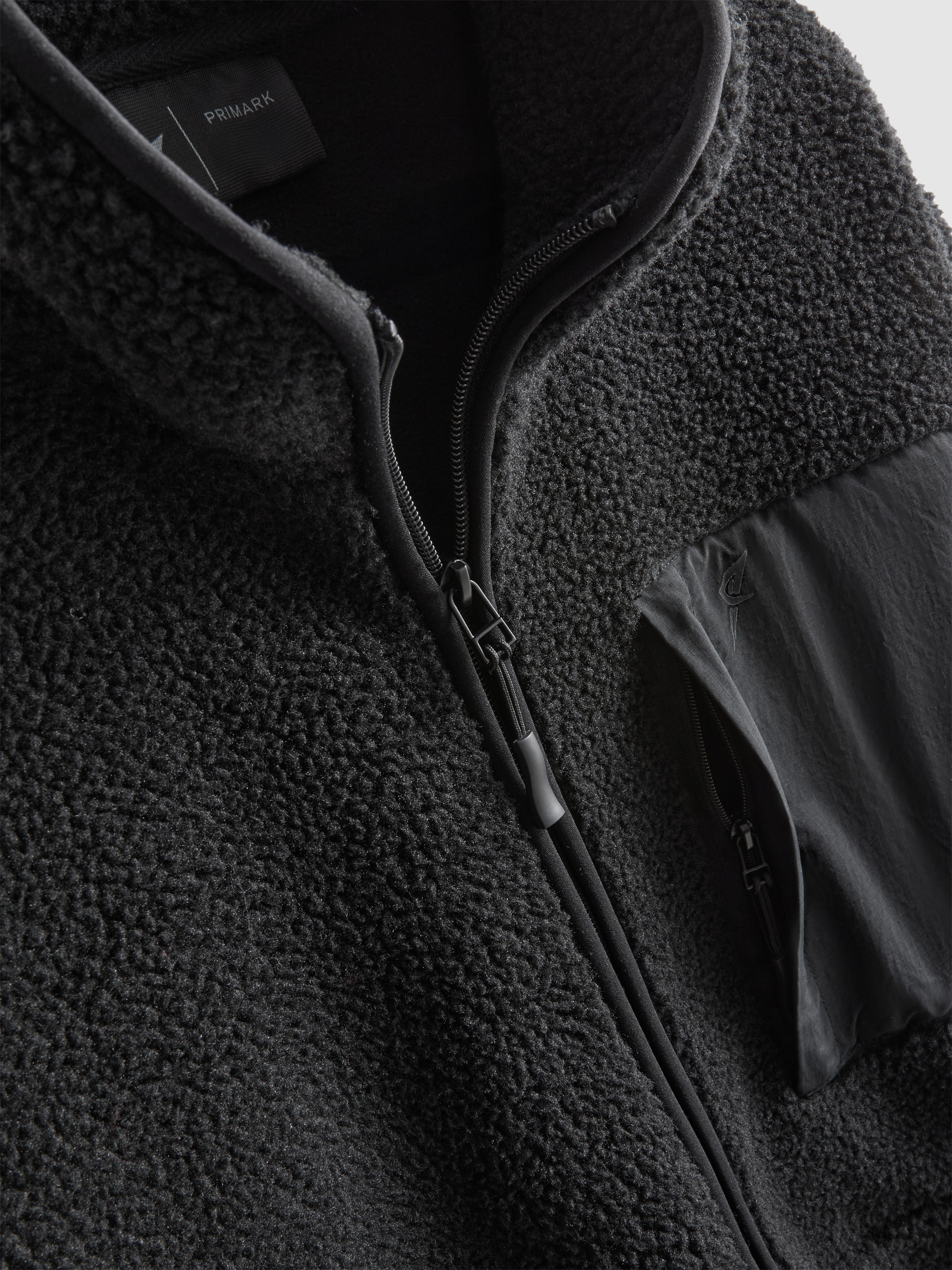 Kożuszkowy polar z zapięciem na suwak 1/2