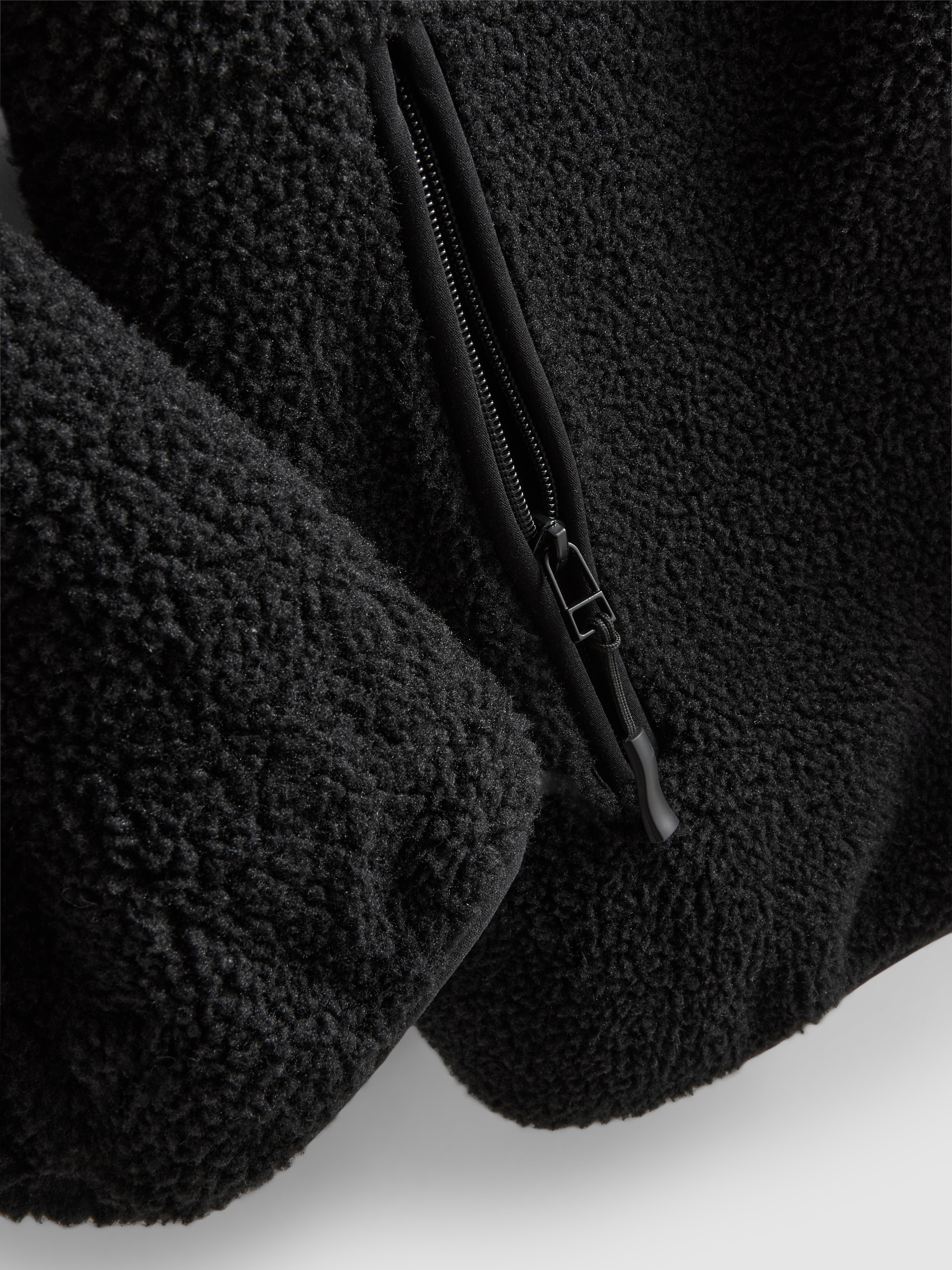 Kożuszkowy polar z zapięciem na suwak 1/2