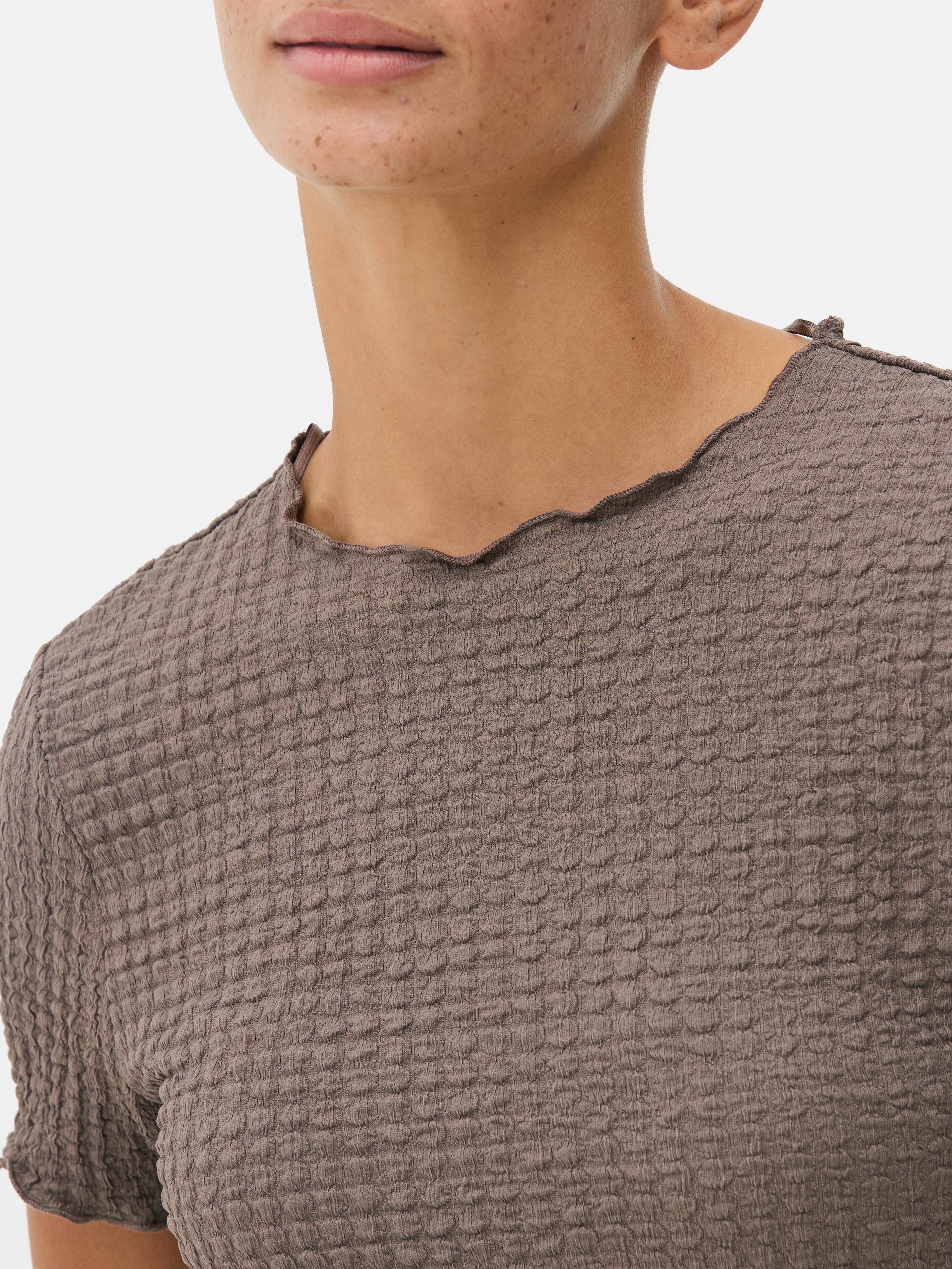 Camiseta fruncida de cuello redondo