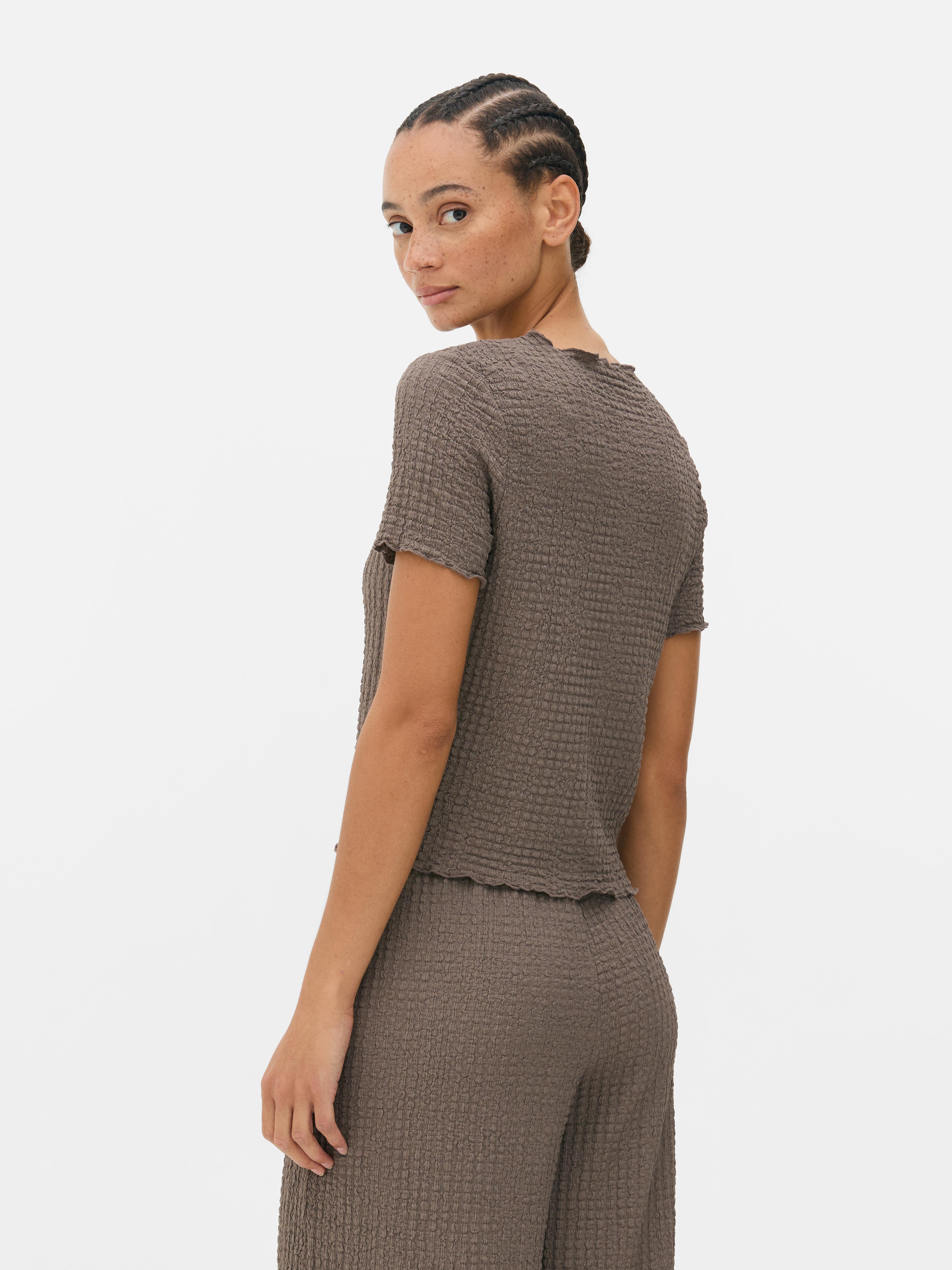 Camiseta fruncida de cuello redondo