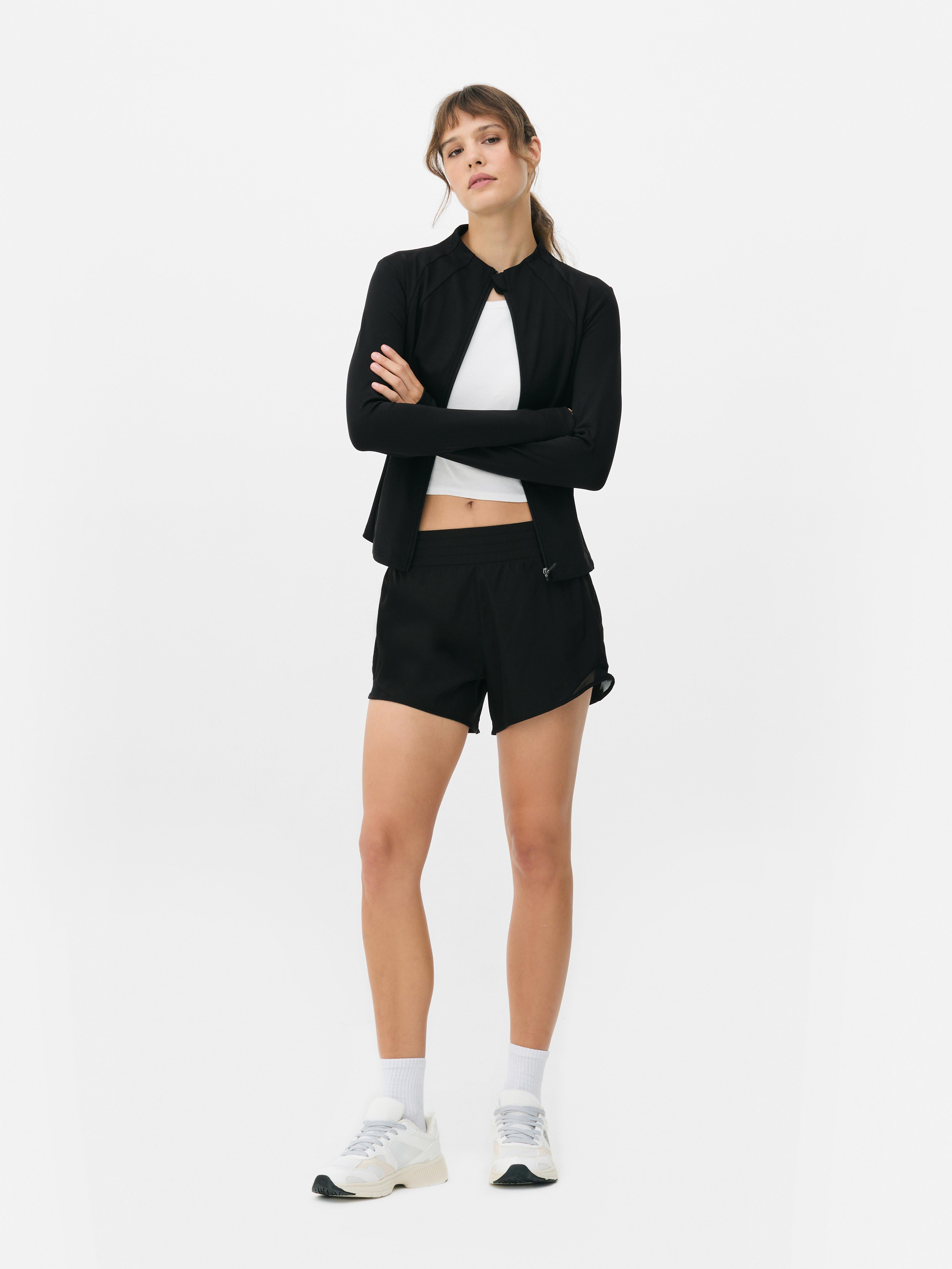 Short de sport à empiècement en maille