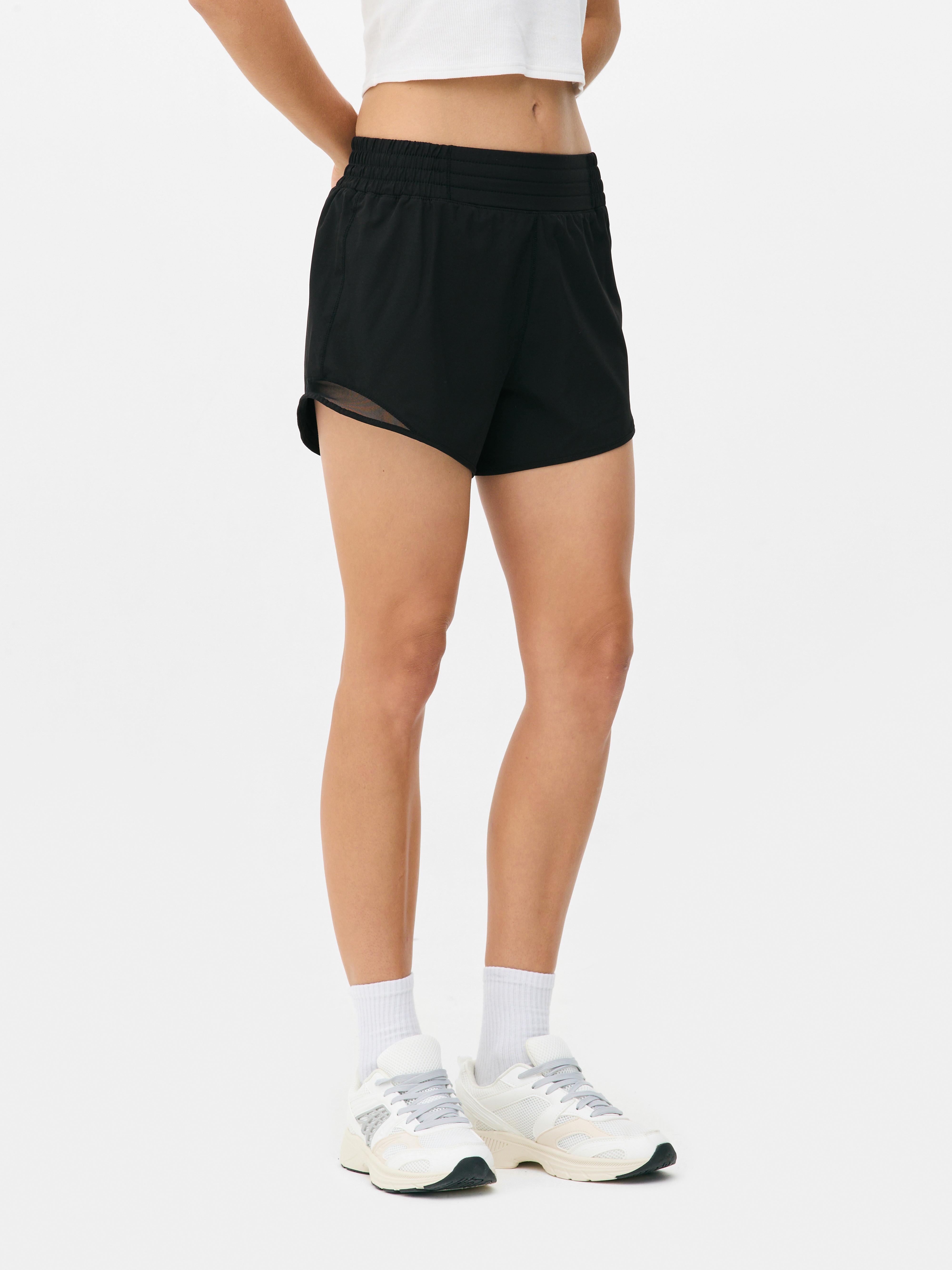 Pantaloncini fitness con inserti in rete