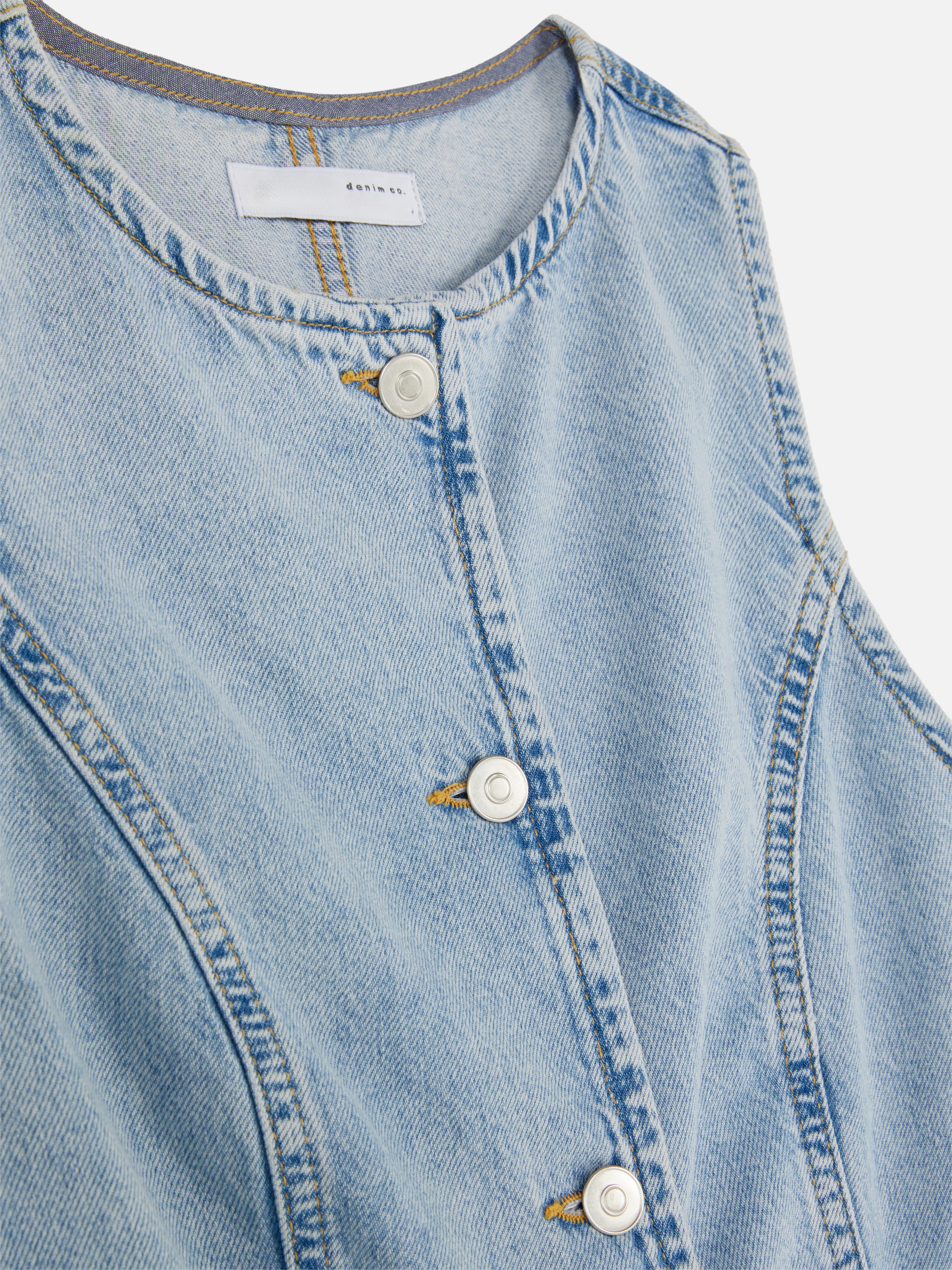 Gilet in denim con spacco sull'orlo