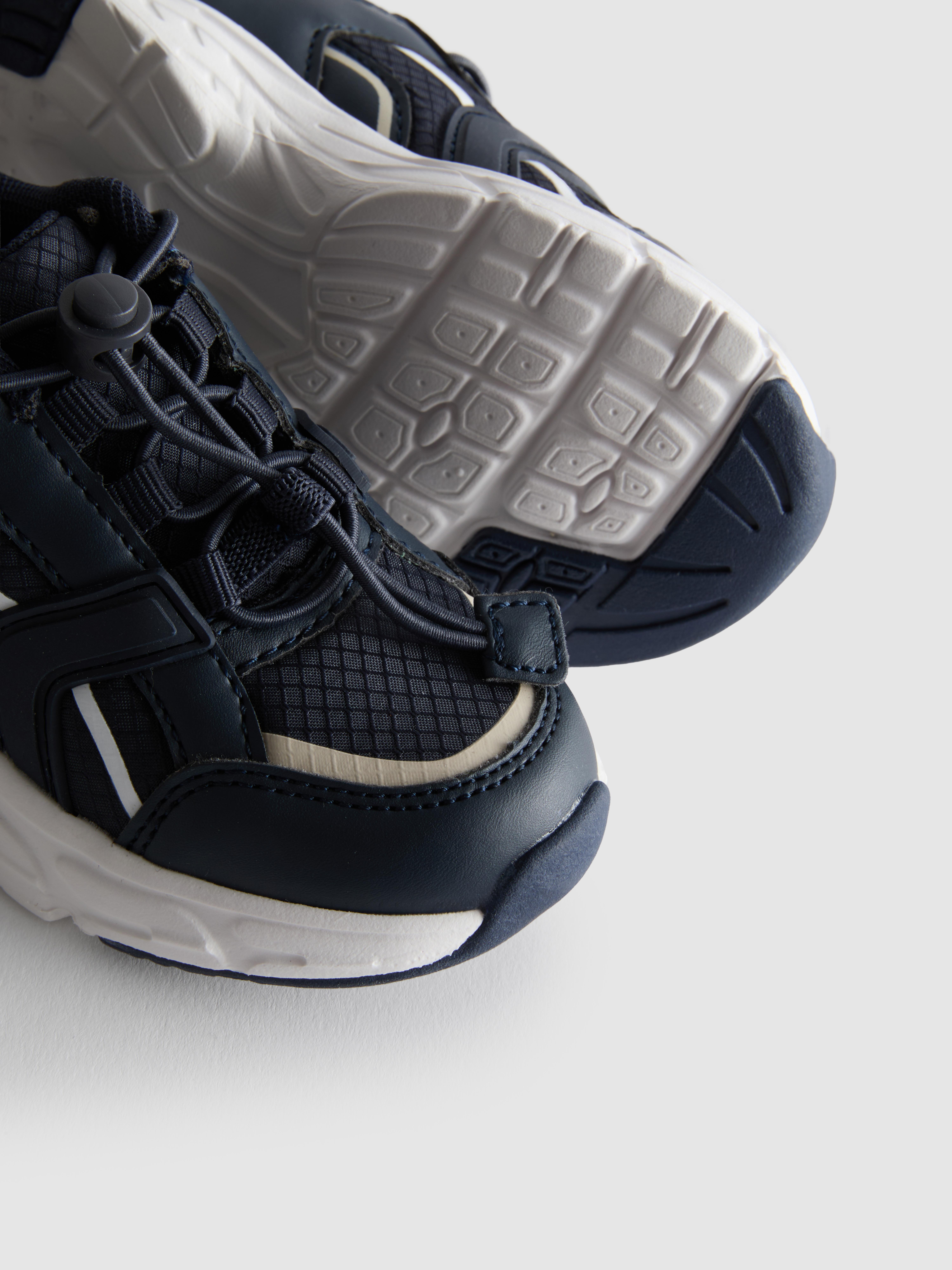 Ténis sola grossa fecho