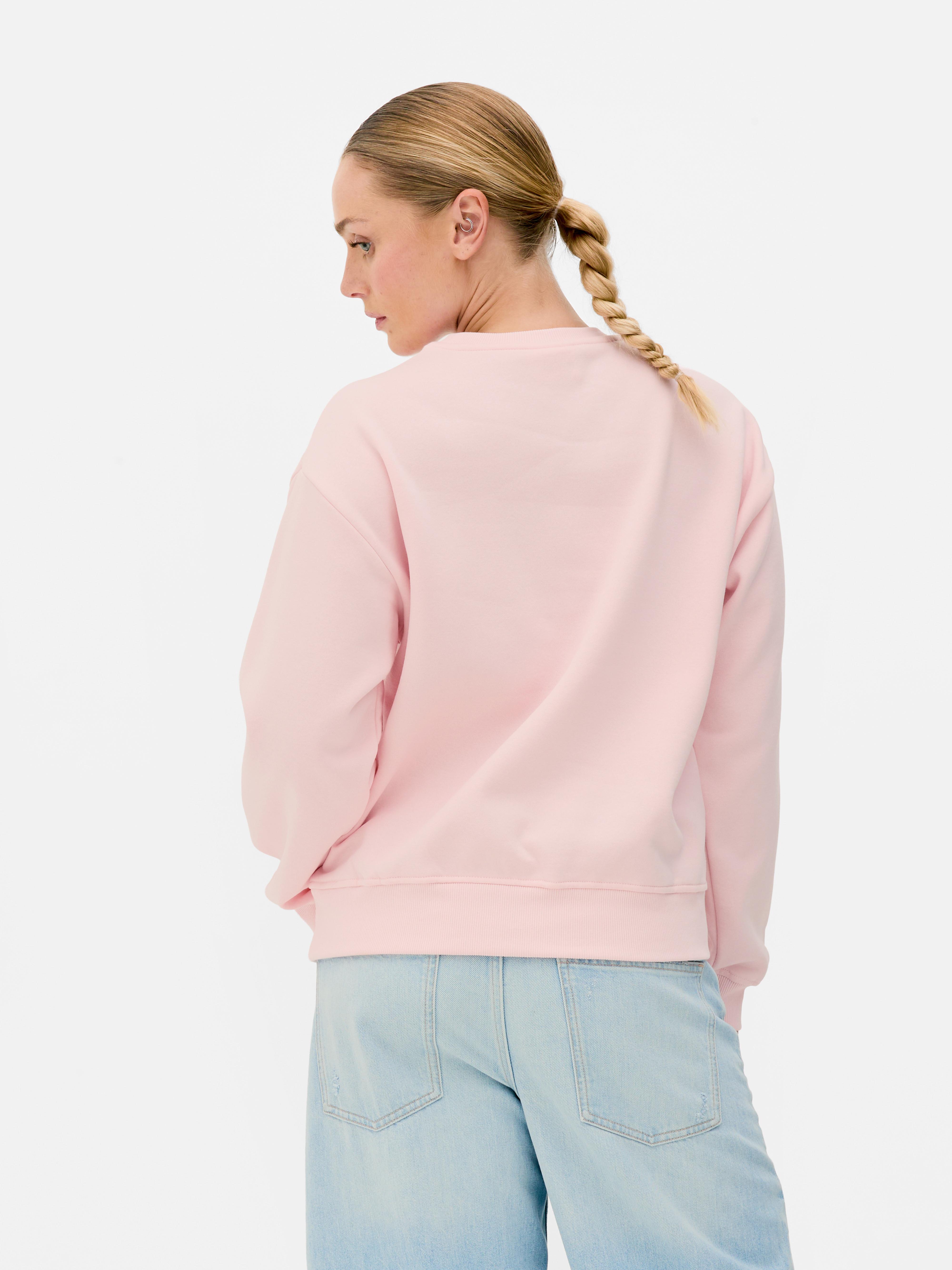 Sudadera de Snoopy jugando al tenis