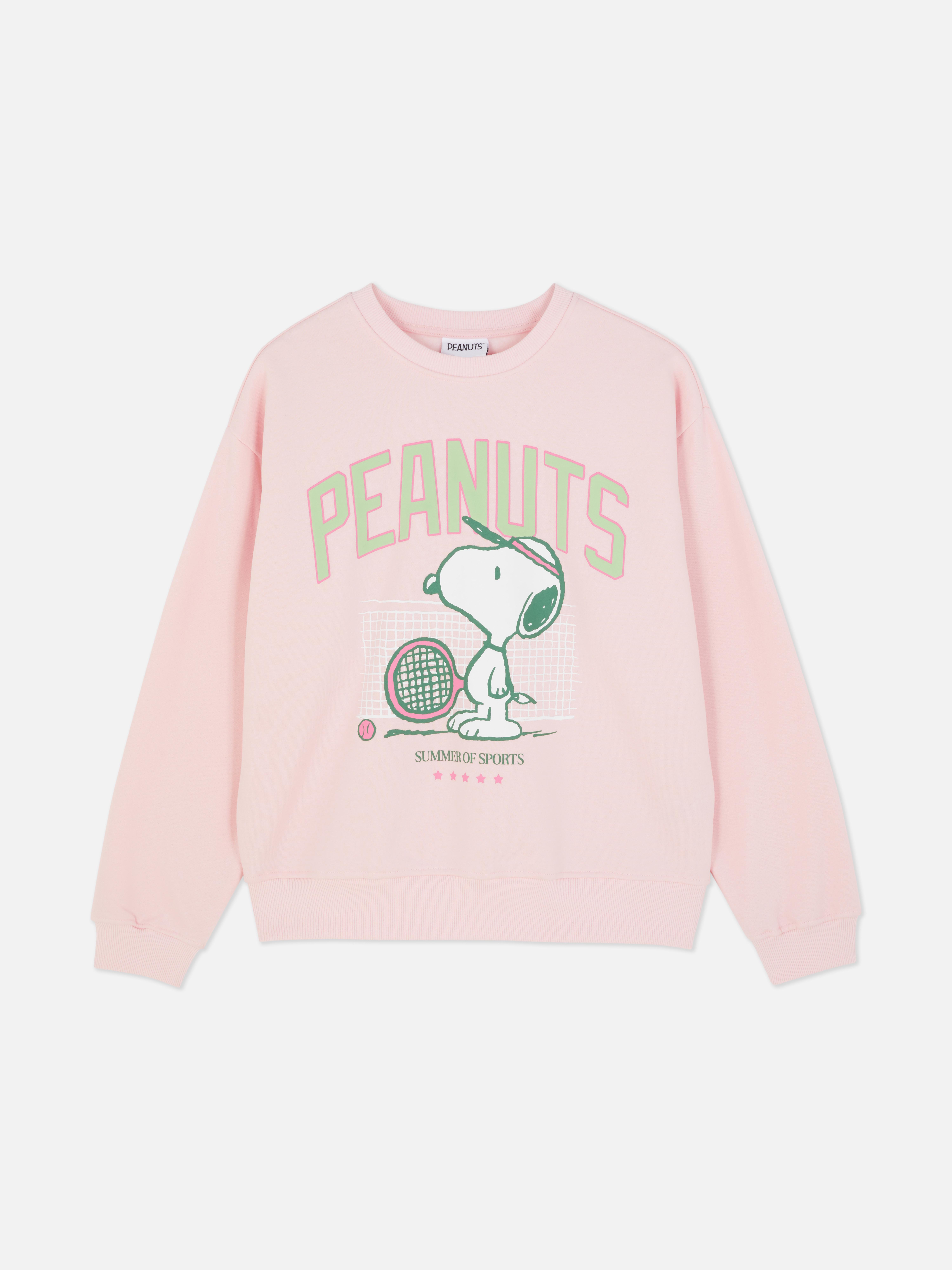 Sudadera de Snoopy jugando al tenis