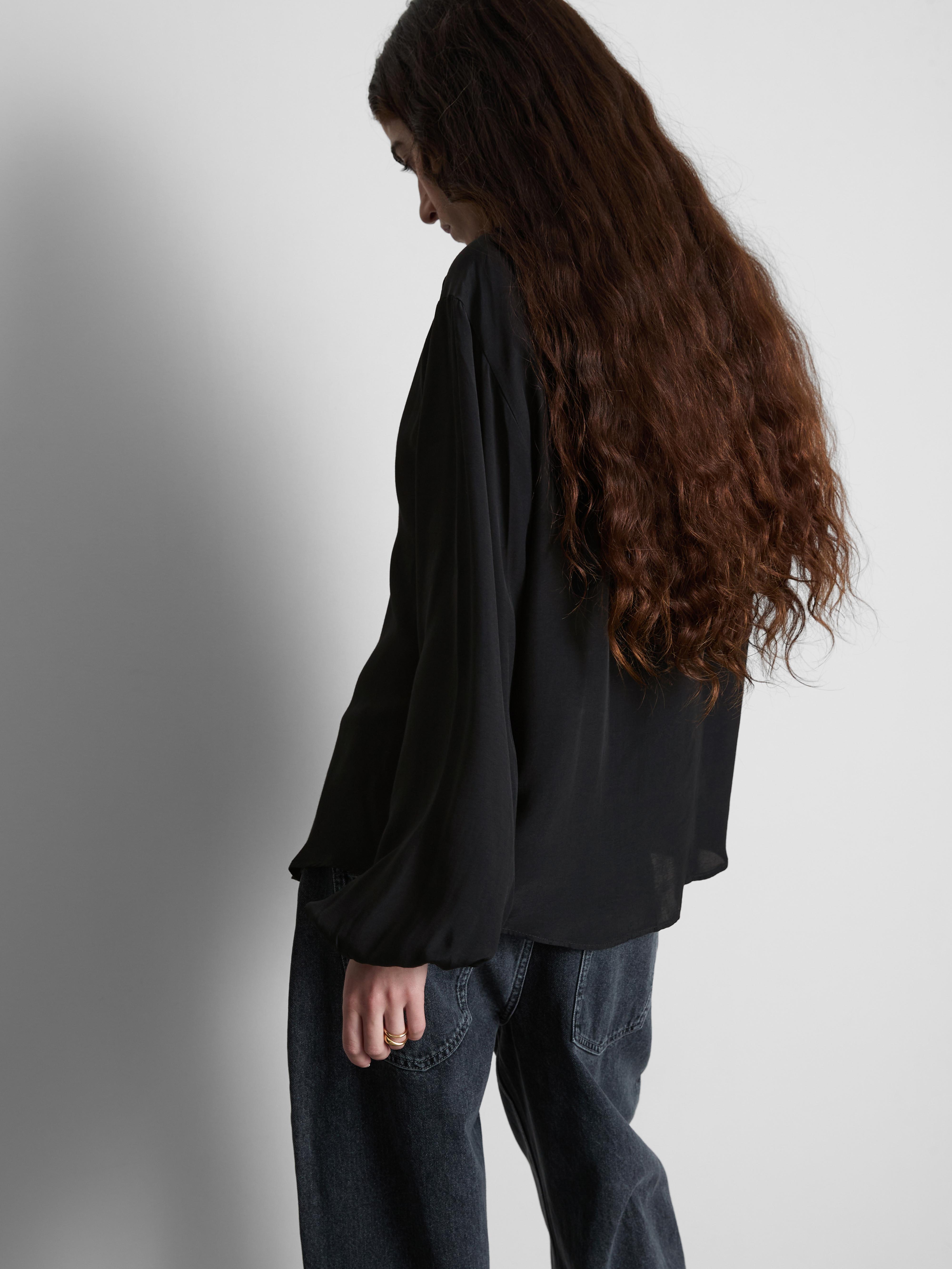 Camicetta a maniche lunghe con bottoni