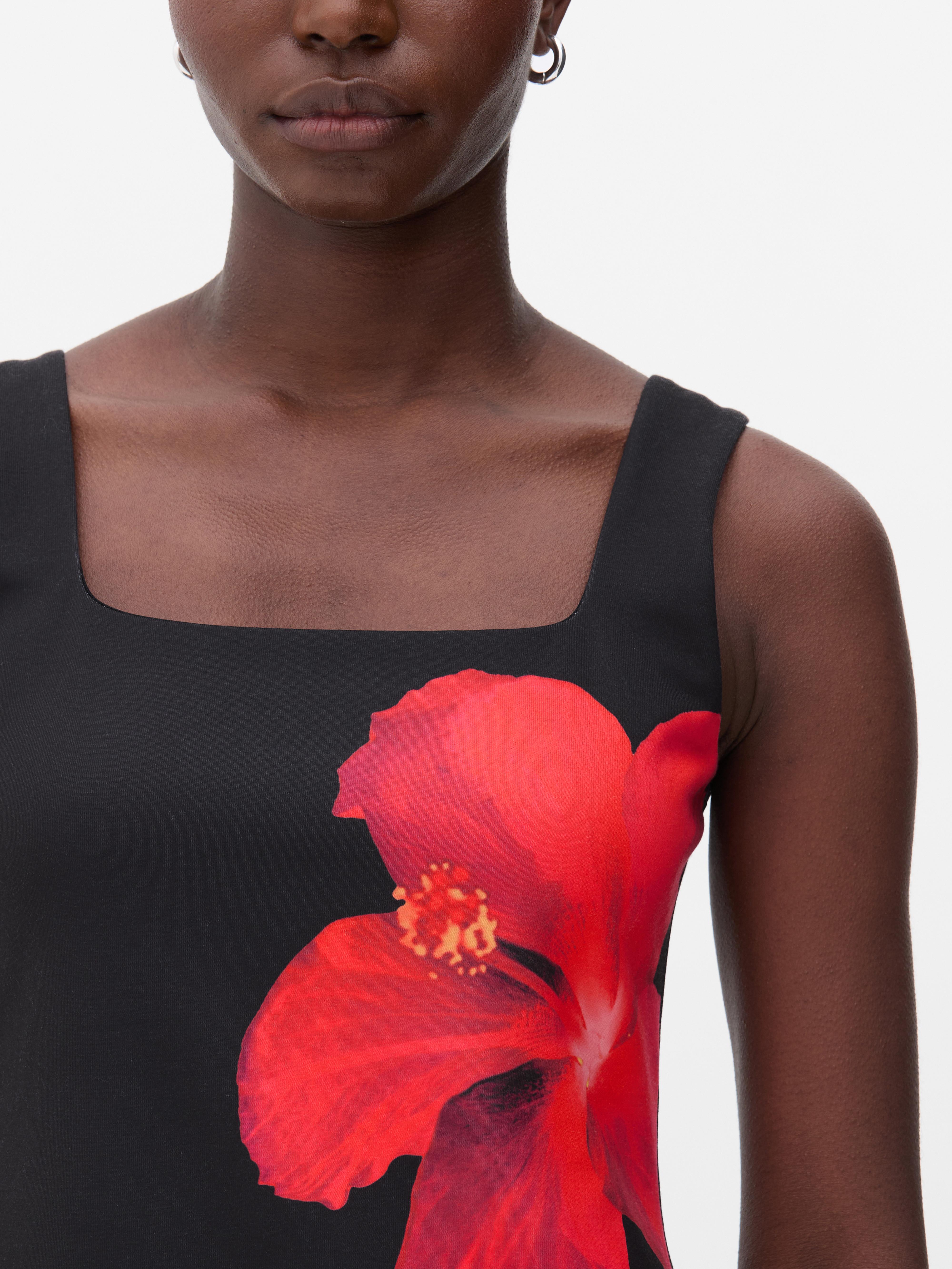 Mini robe à bretelles et motif hibiscus