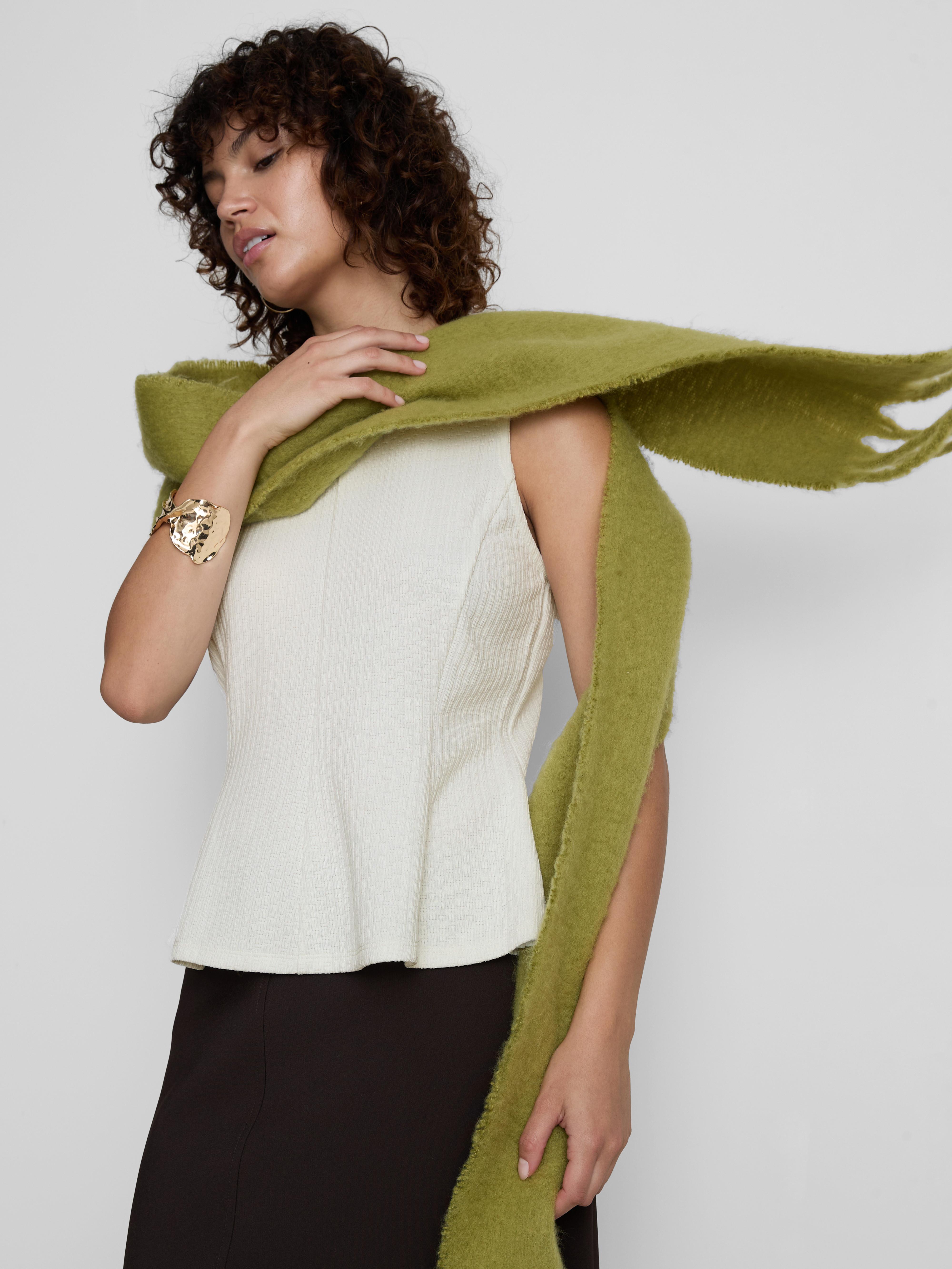 Top smanicato con volant
