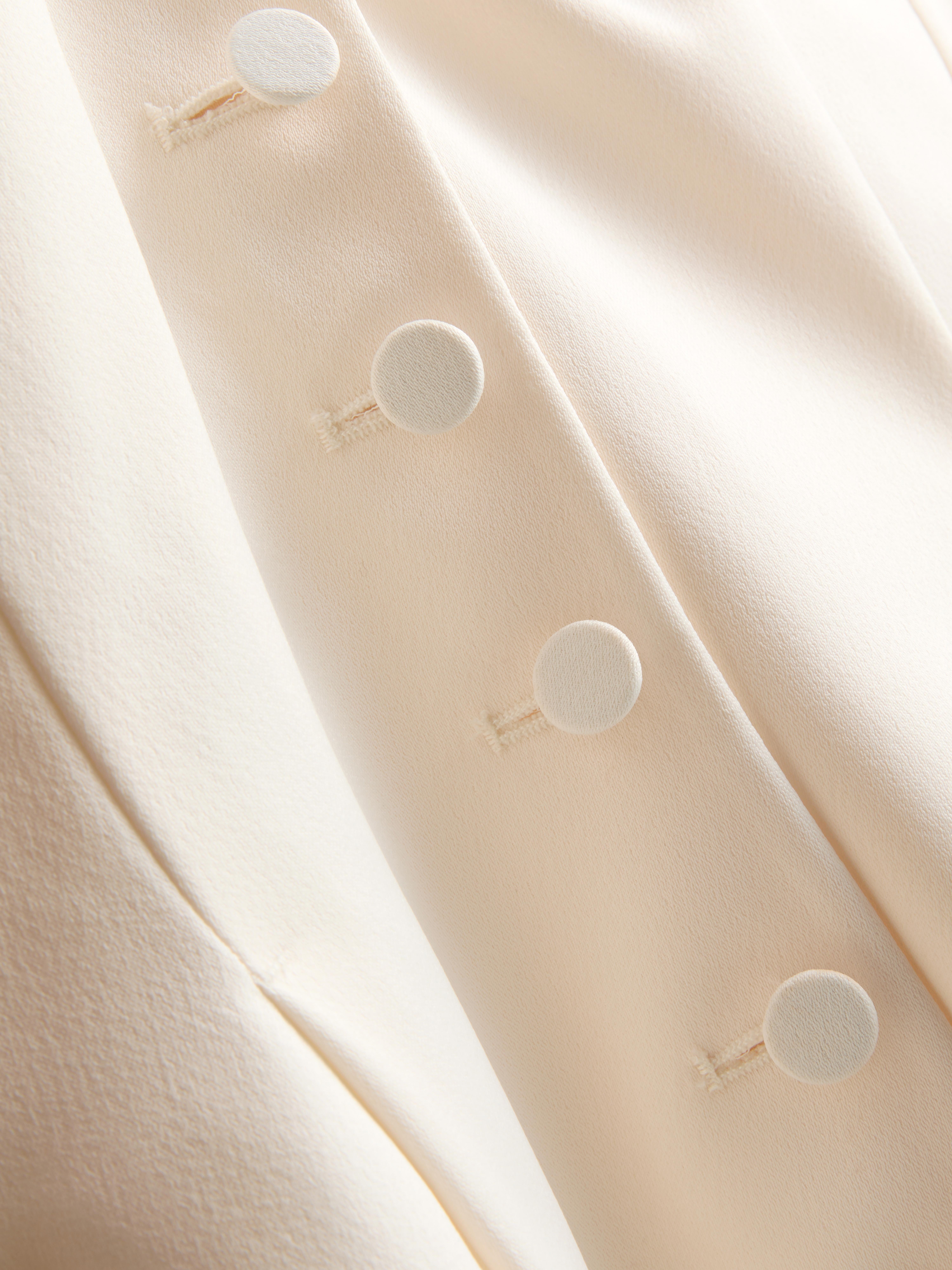 Chaleco de satén con cuello halter