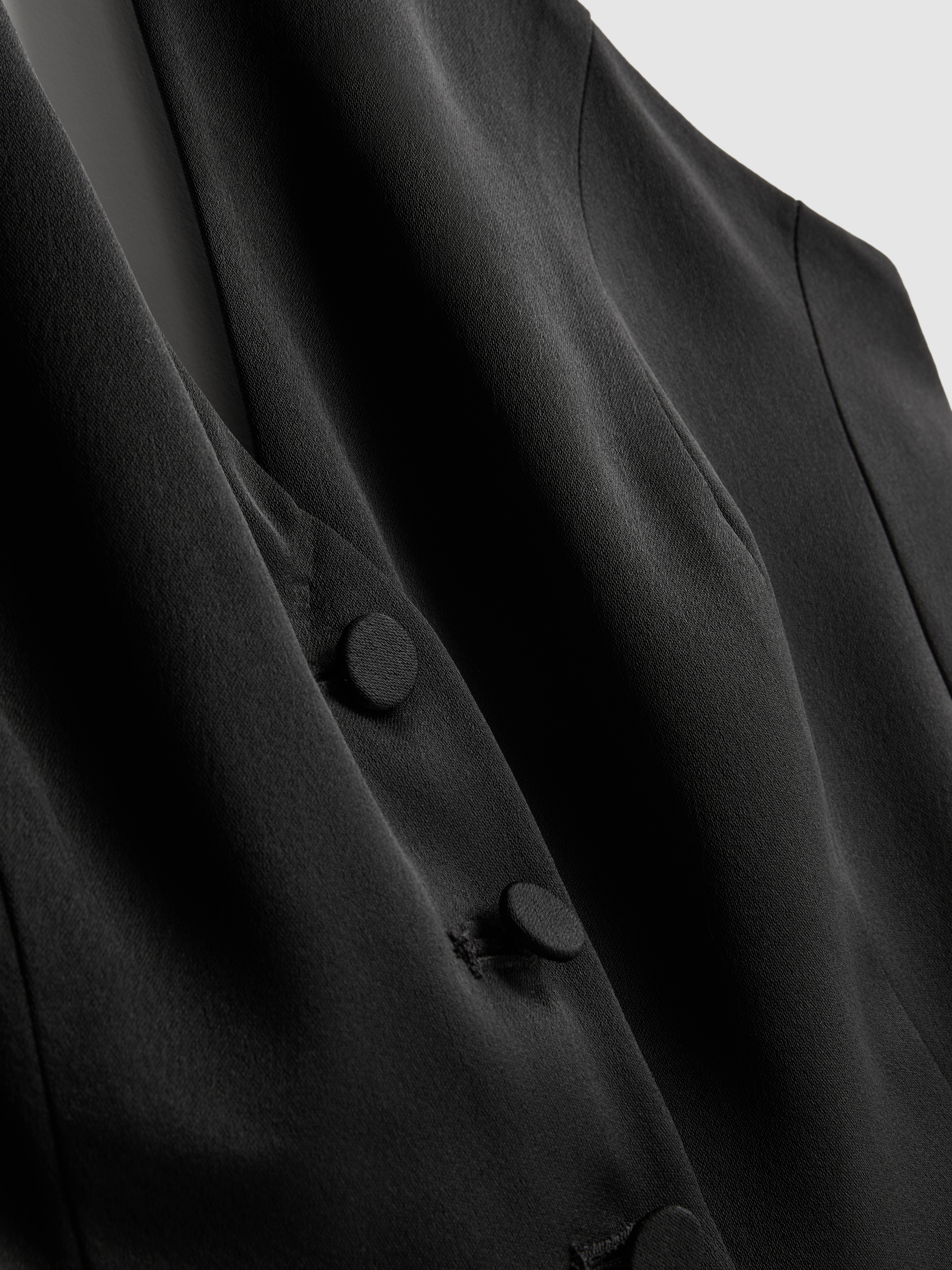 Chaleco de satén con cuello halter