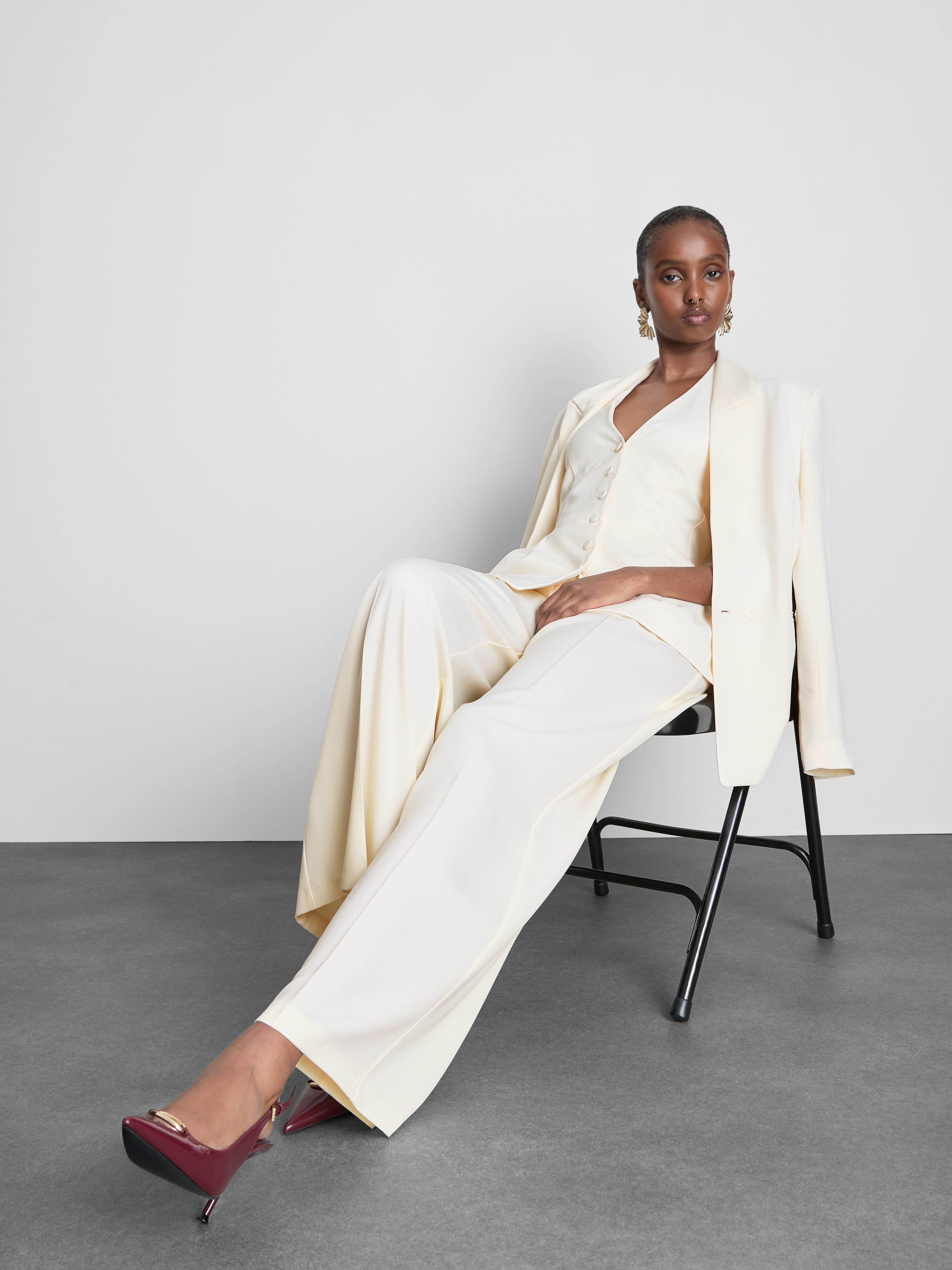 Pantalones de satén plisados de pernera ancha Color crudo