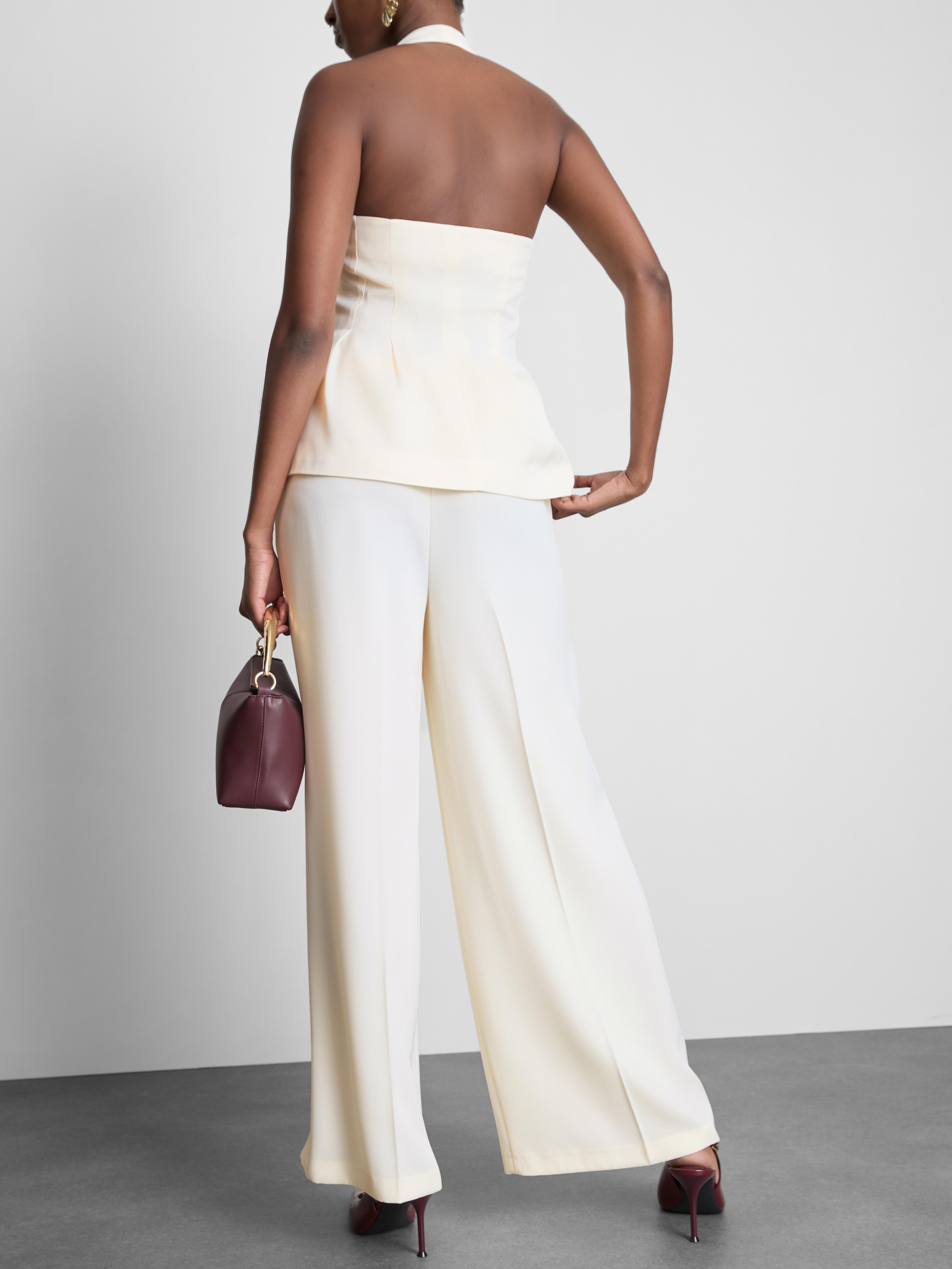 Pantalones de satén plisados de pernera ancha